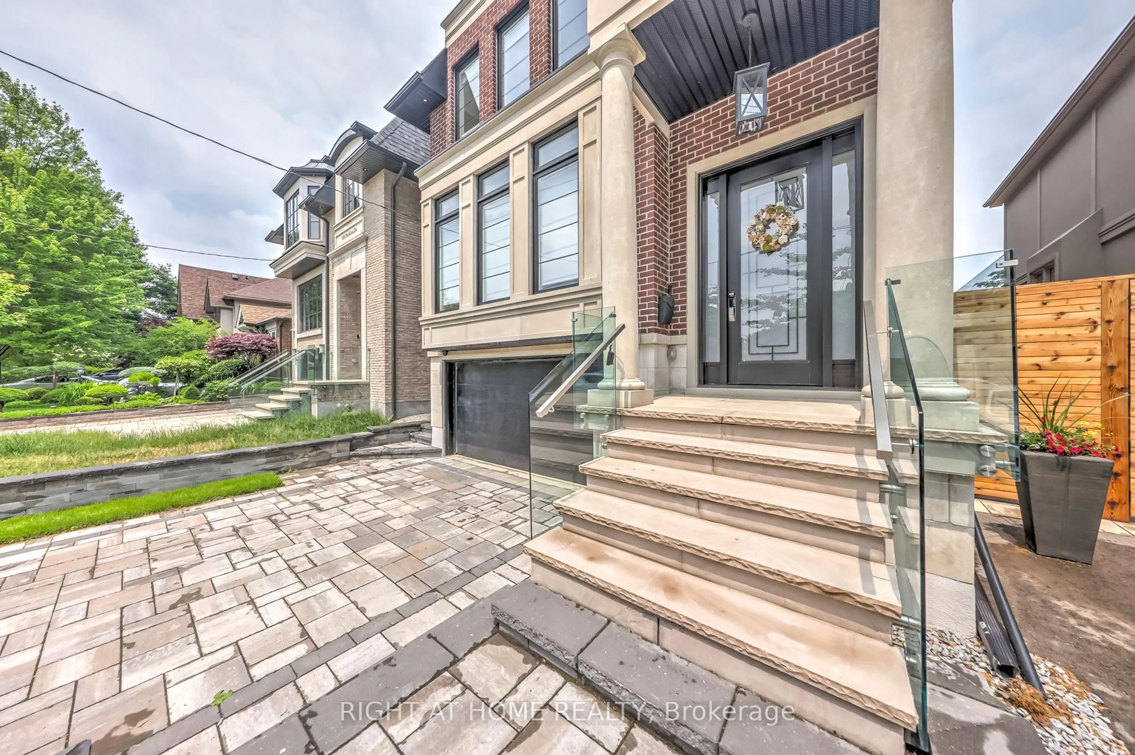 Home with brick exterior material, street for 102 Parklea Dr, Toronto Ontario M4G 2J8