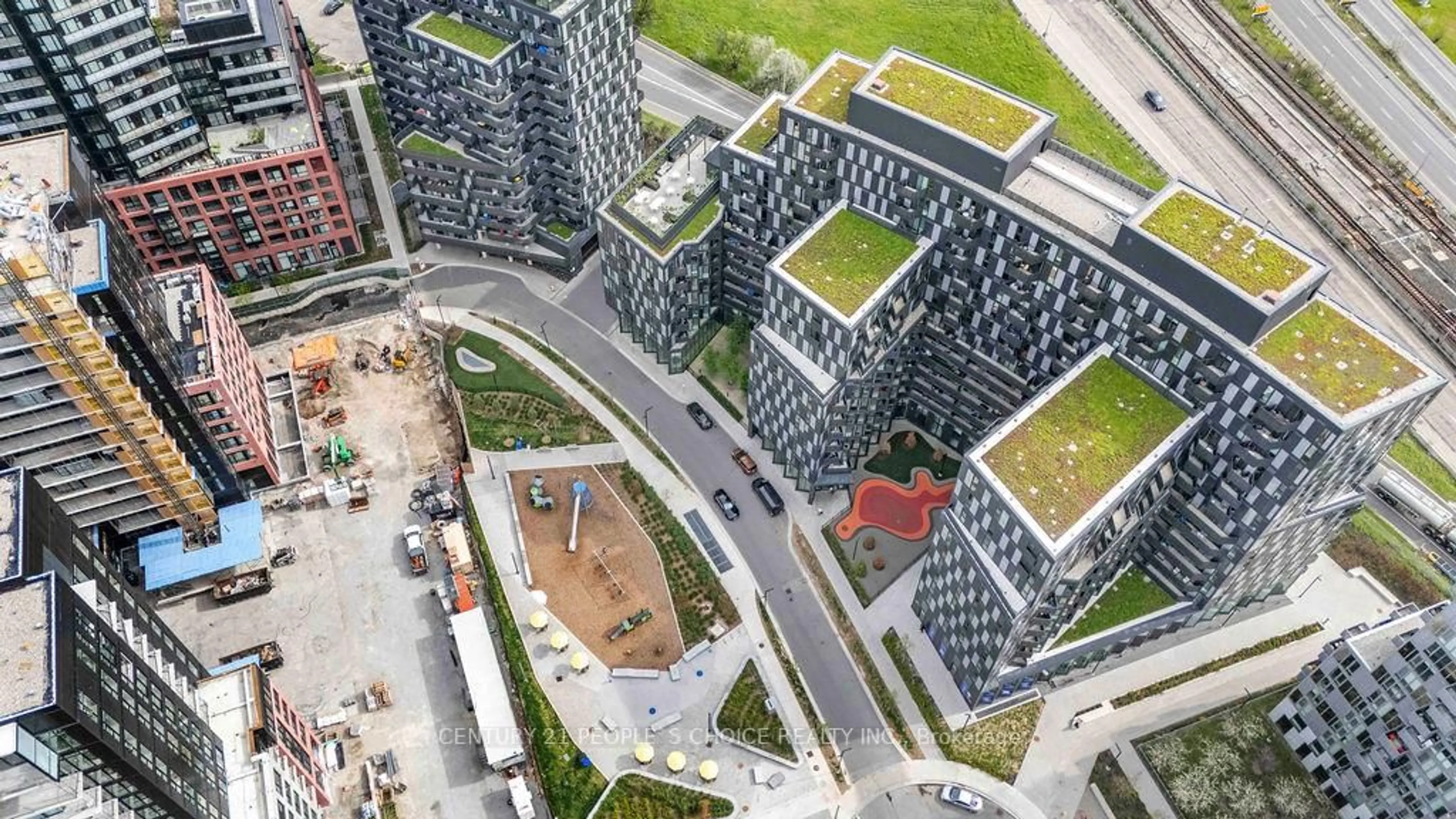 A pic from outside/outdoor area/front of a property/back of a property/a pic from drone, city buildings view from balcony for 30 Tretti Way #1004, Toronto Ontario M3H 0E3