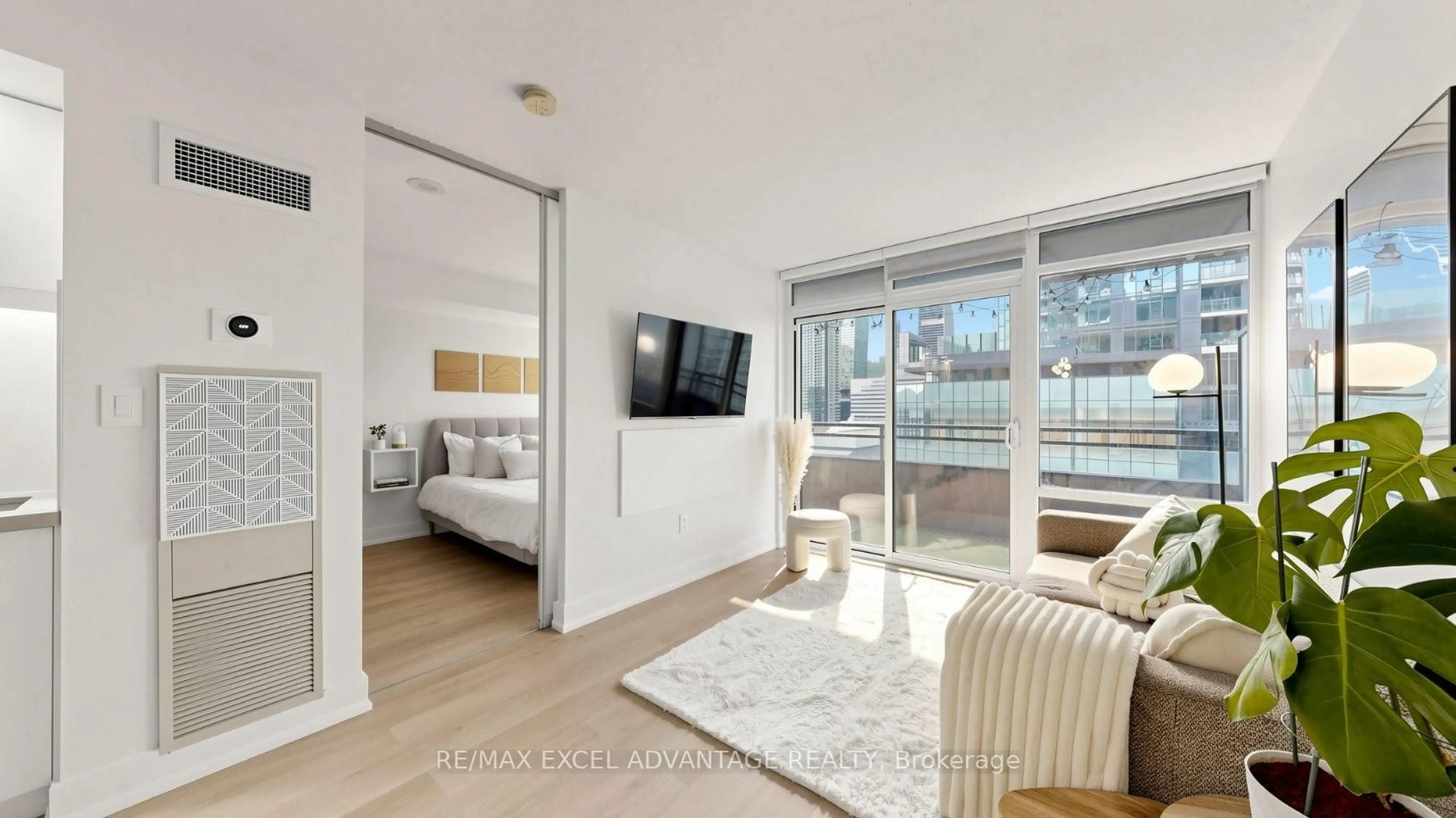 Living room with furniture, wood/laminate floor for 4K Spadina Ave #1509, Toronto Ontario M5V 3Y9