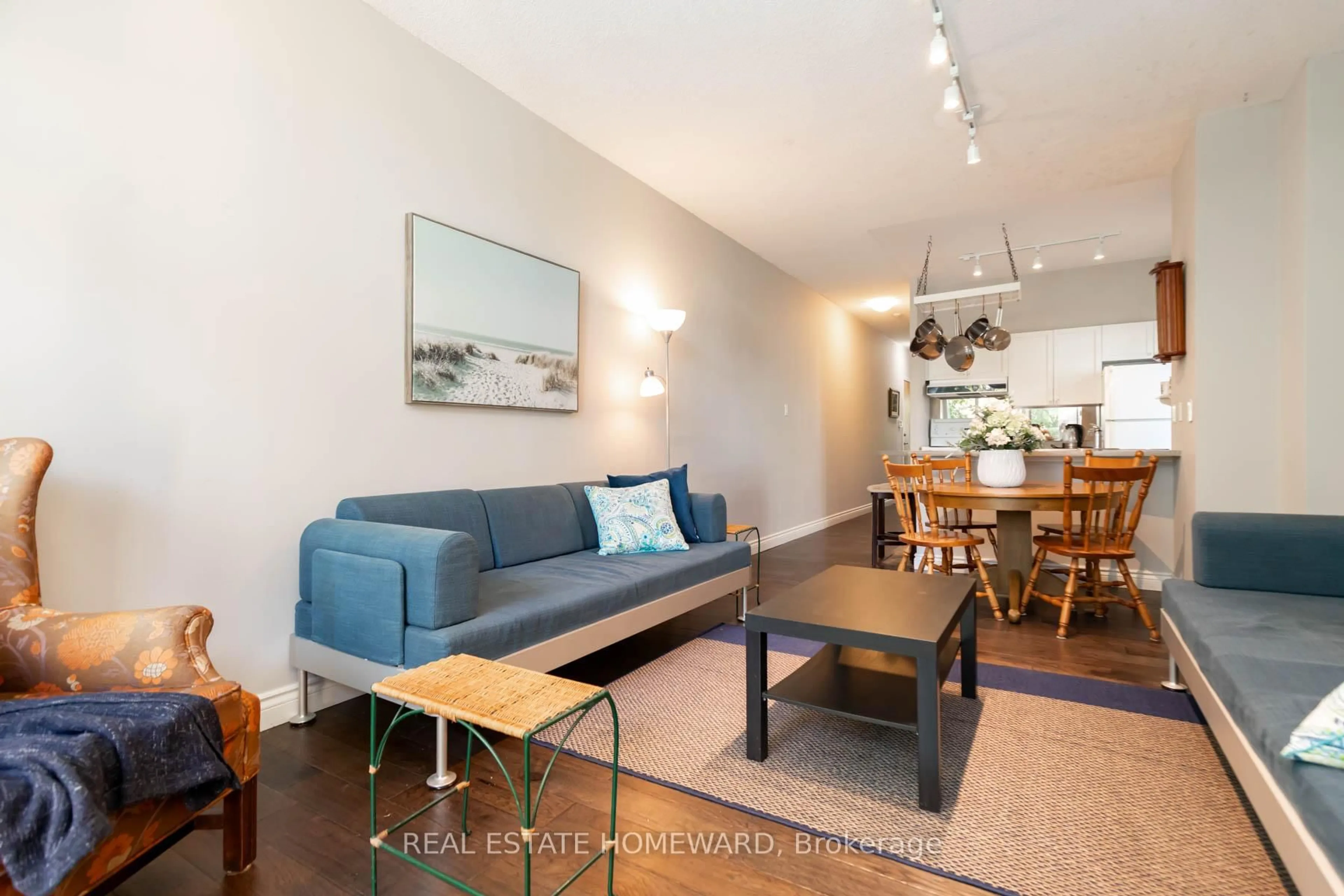 Living room with furniture, wood/laminate floor for 600 Queens Quay #101, Toronto Ontario M5V 3M3
