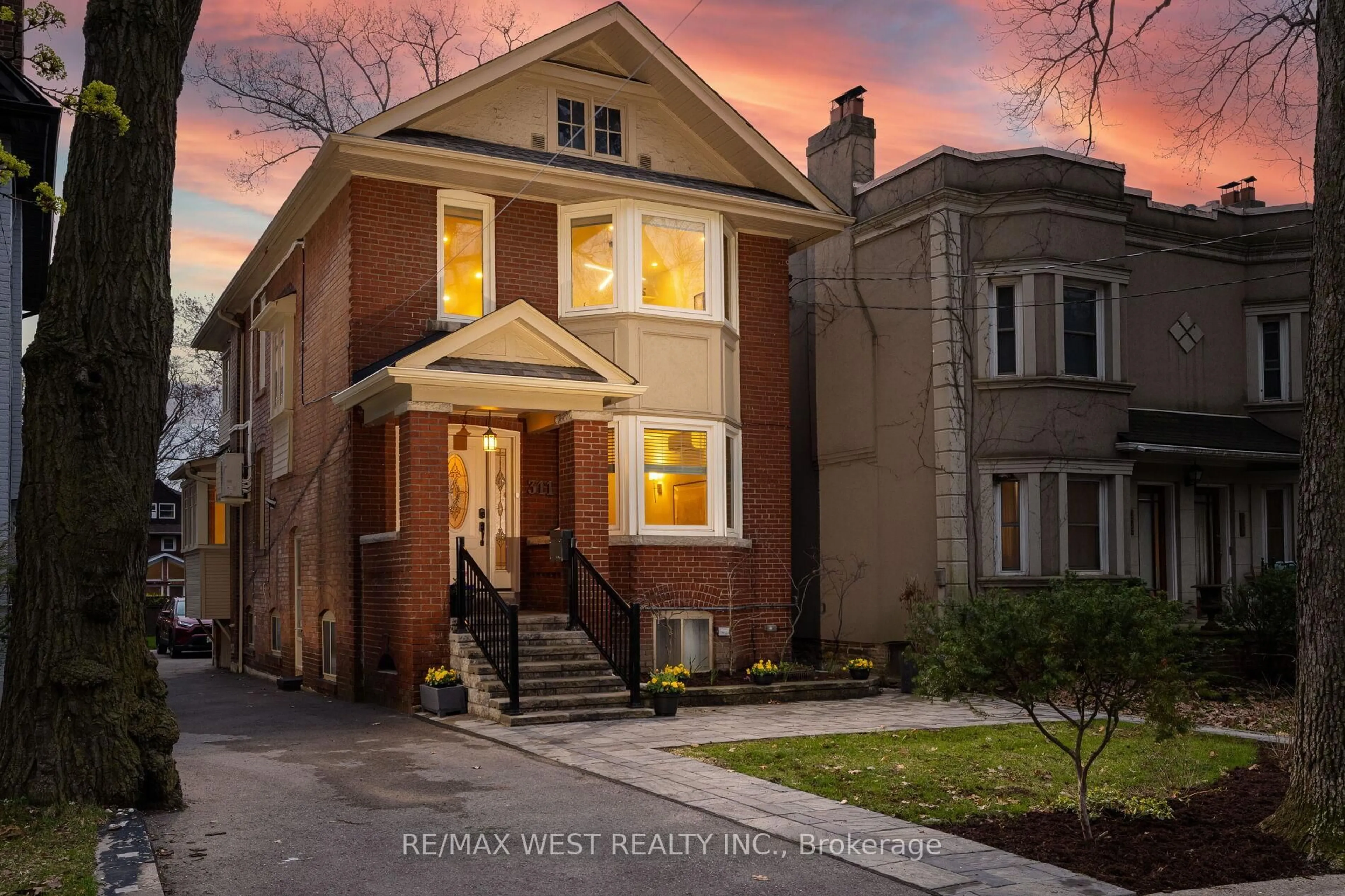 Home with brick exterior material, street for 311 St Clair Ave, Toronto Ontario M4T 1P3