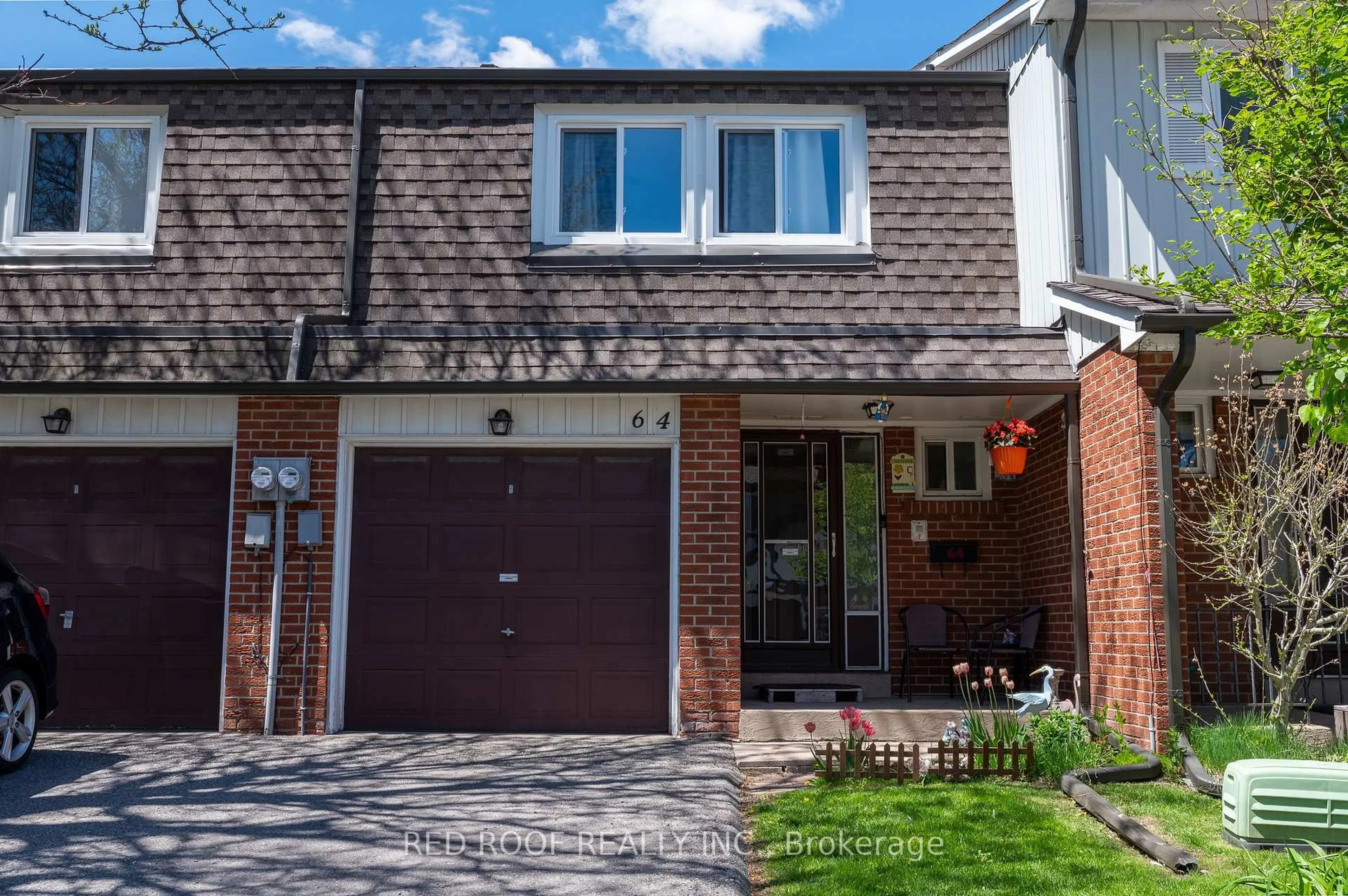 Home with brick exterior material, street for 64 Farm Green Way #64, Toronto Ontario M3A 3M2