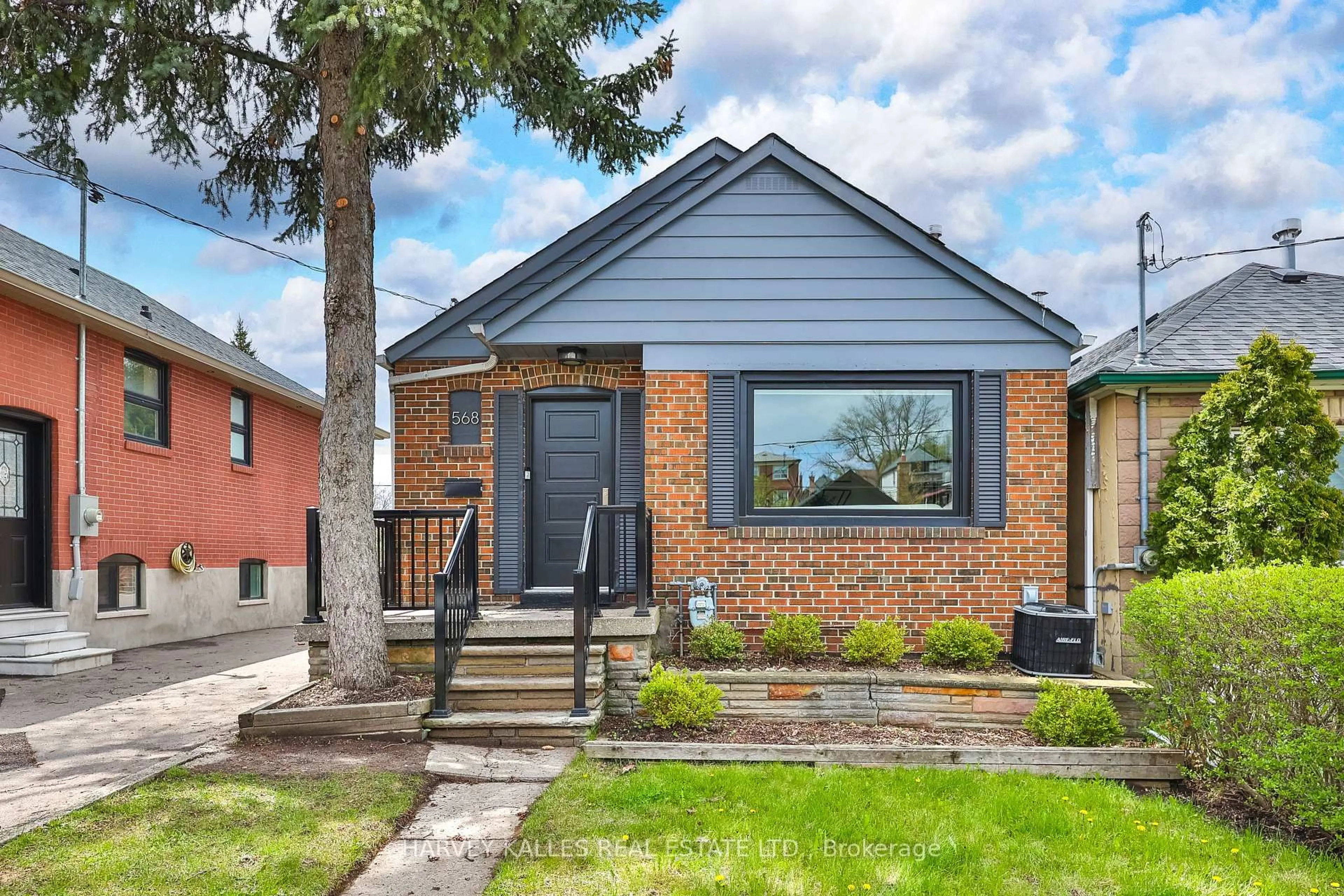 Home with brick exterior material, street for 568 Northcliffe Blvd, Toronto Ontario M6E 3L7