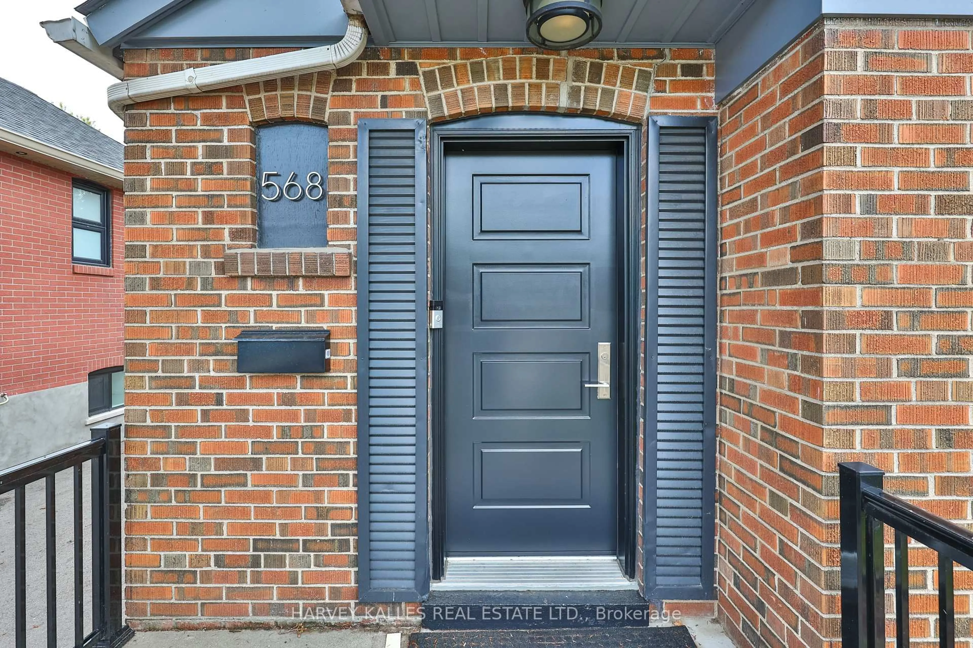 Home with brick exterior material, street for 568 Northcliffe Blvd, Toronto Ontario M6E 3L7