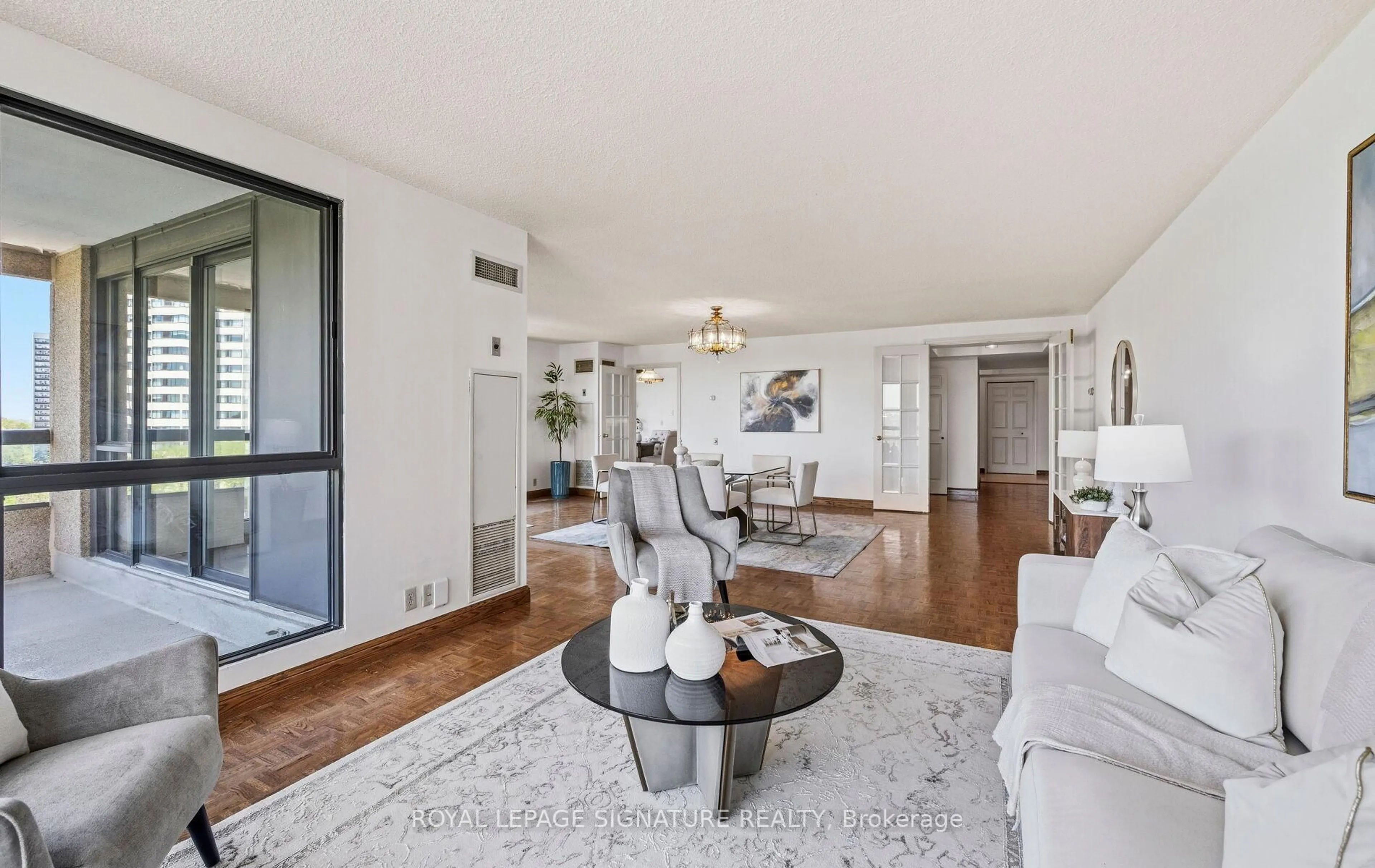 Living room with furniture, unknown for 3 Concorde Pl #805, Toronto Ontario M3C 3K7