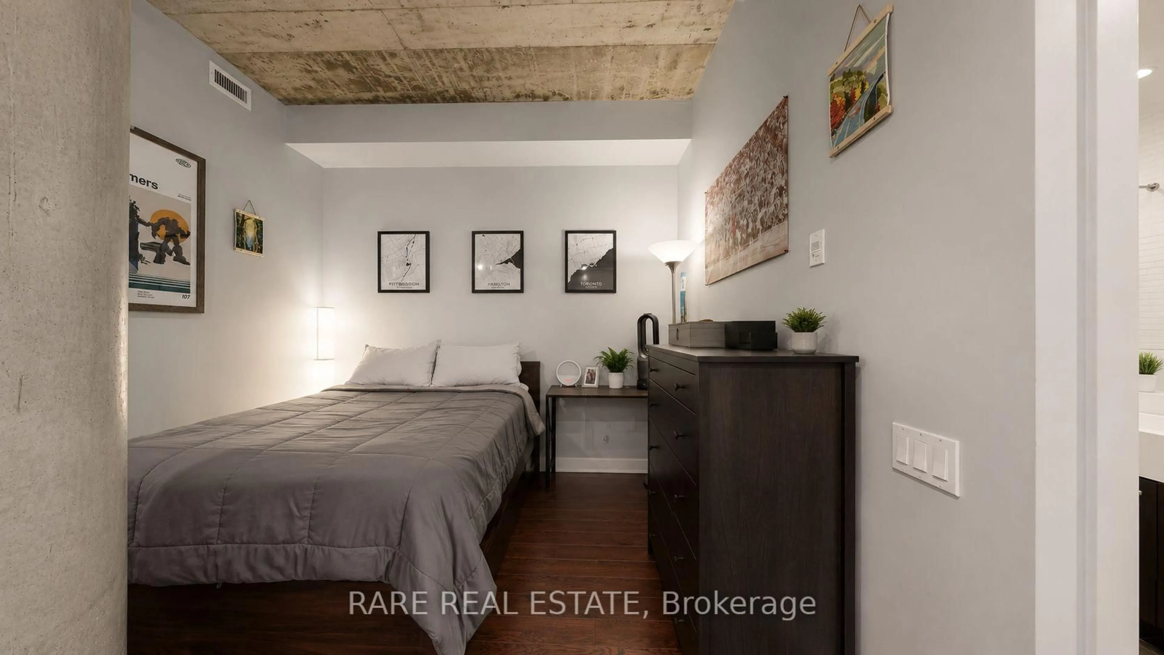 Bedroom with bed, wood/laminate floor for 66 Portland St #205, Toronto Ontario M5V 2M6
