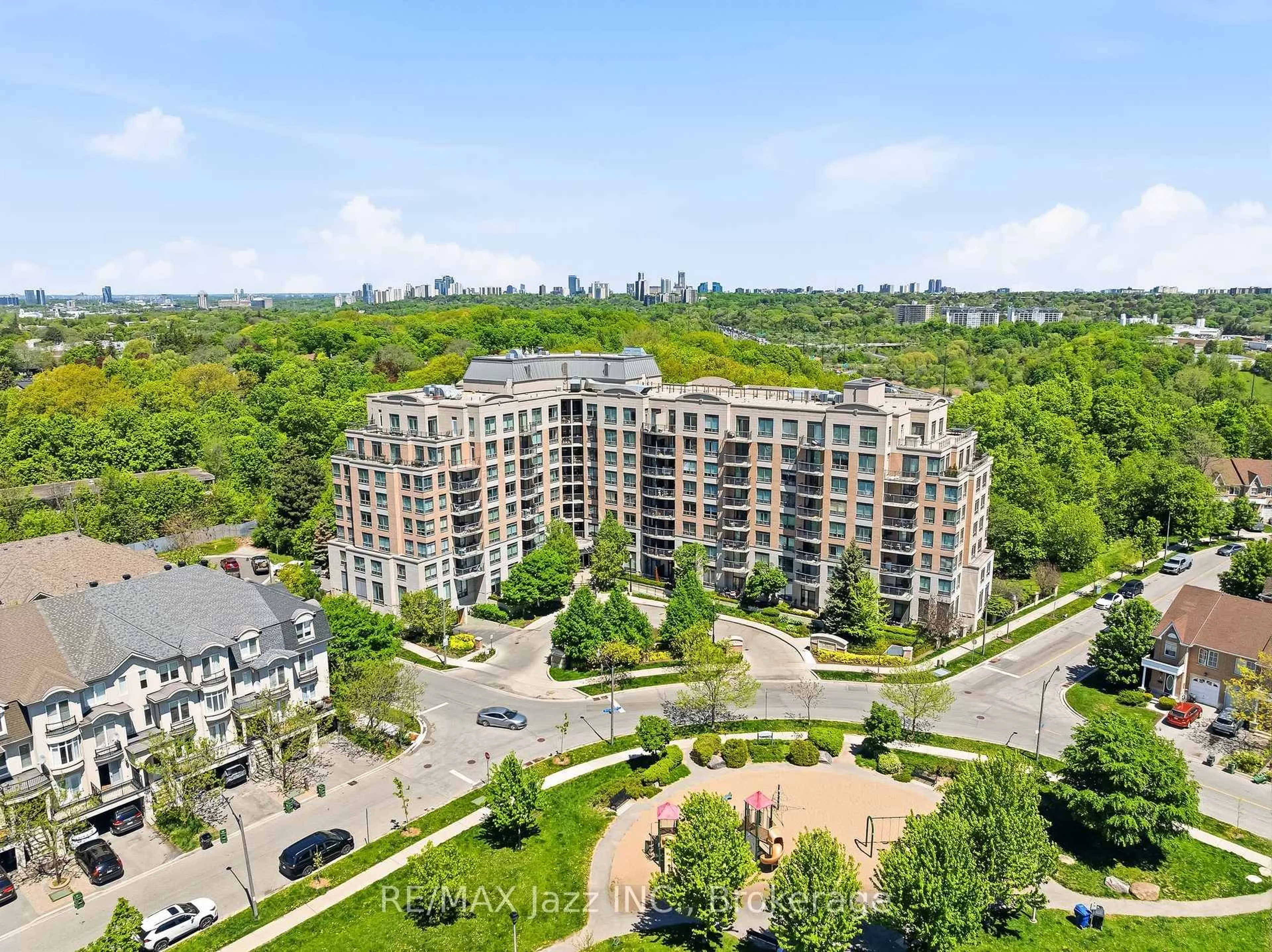 A pic from outside/outdoor area/front of a property/back of a property/a pic from drone, city buildings view from balcony for 16 Dallimore Circ #307, Toronto Ontario M3C 4C4