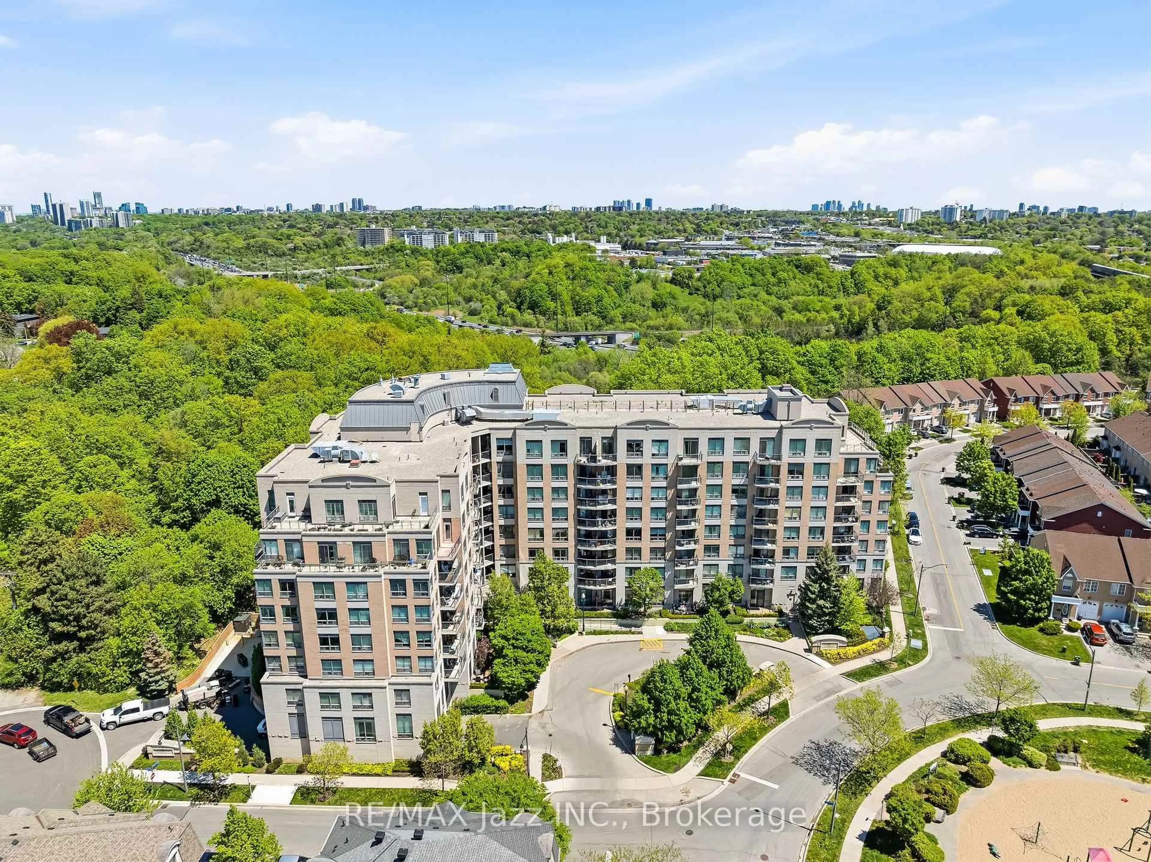 A pic from outside/outdoor area/front of a property/back of a property/a pic from drone, city buildings view from balcony for 16 Dallimore Circ #307, Toronto Ontario M3C 4C4