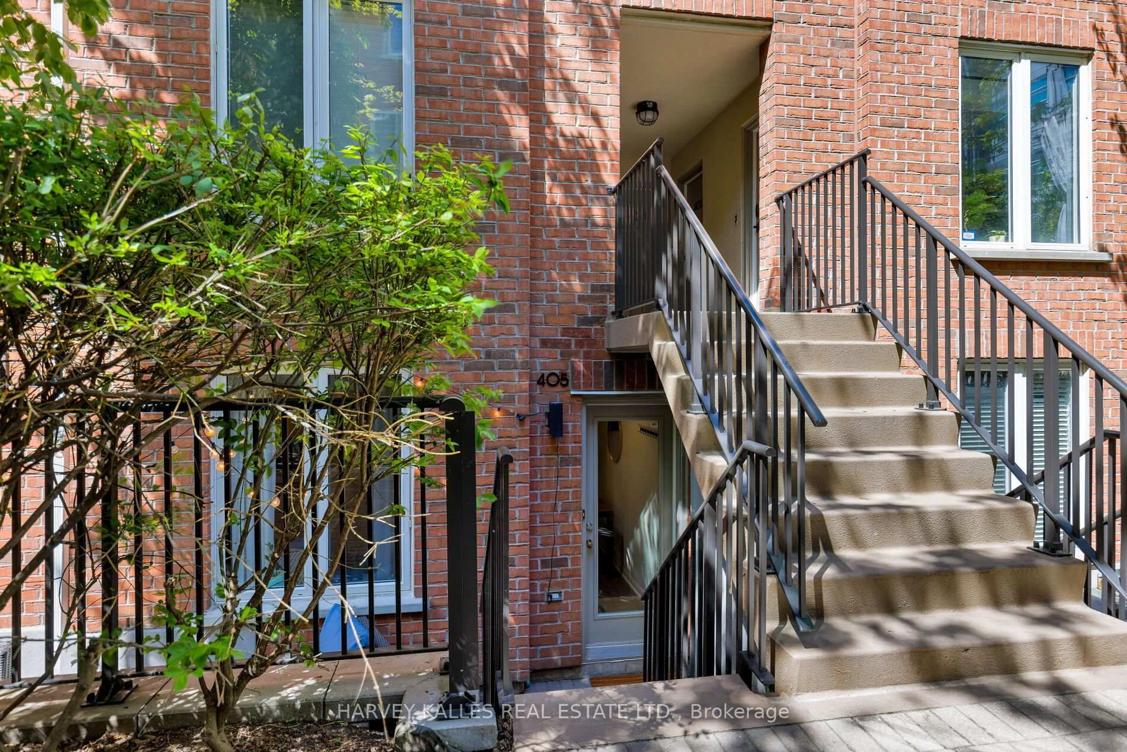 Home with brick exterior material, street for 29 Canniff St #405, Toronto Ontario M6K 3M5