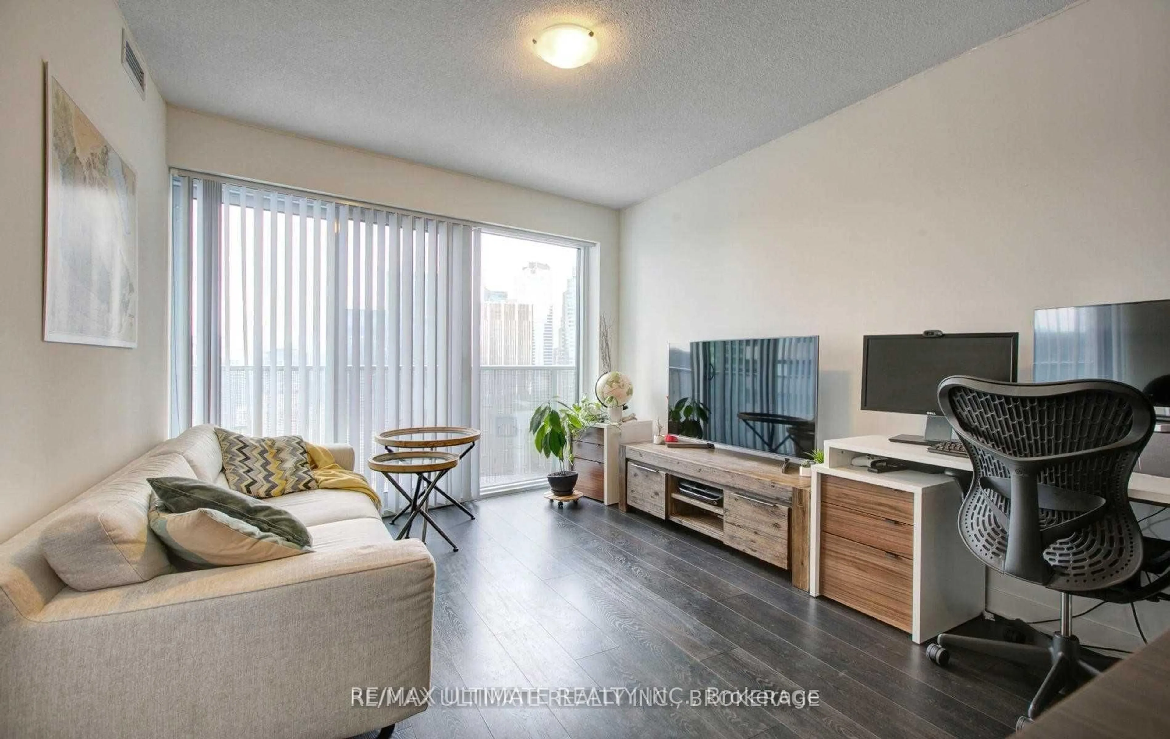 Living room with furniture, wood/laminate floor for 88 Harbour St #4203, Toronto Ontario M5J 0C3