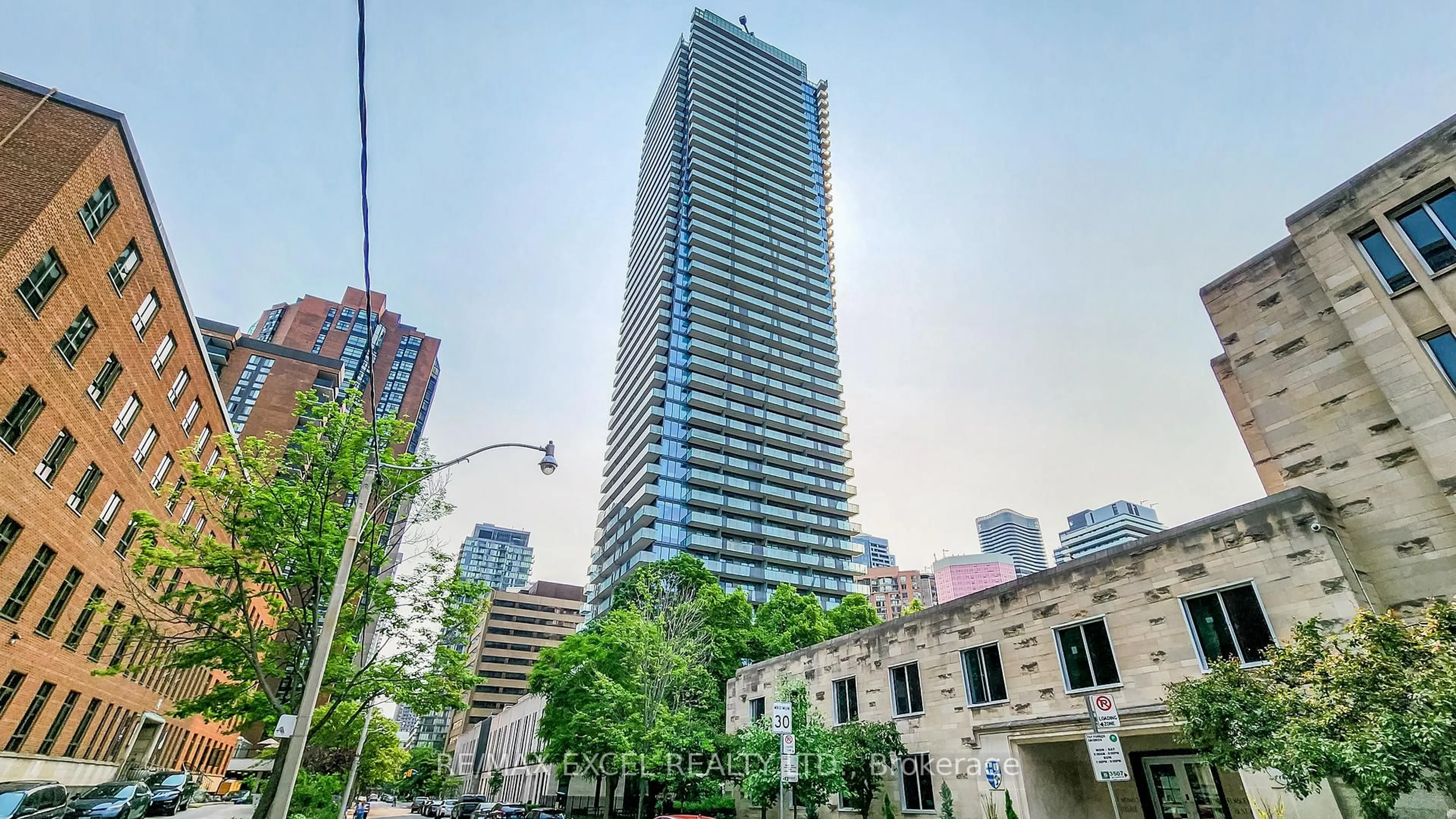 Patio, city buildings view from balcony for 65 St. Mary St #4105, Toronto Ontario M5S 0A6