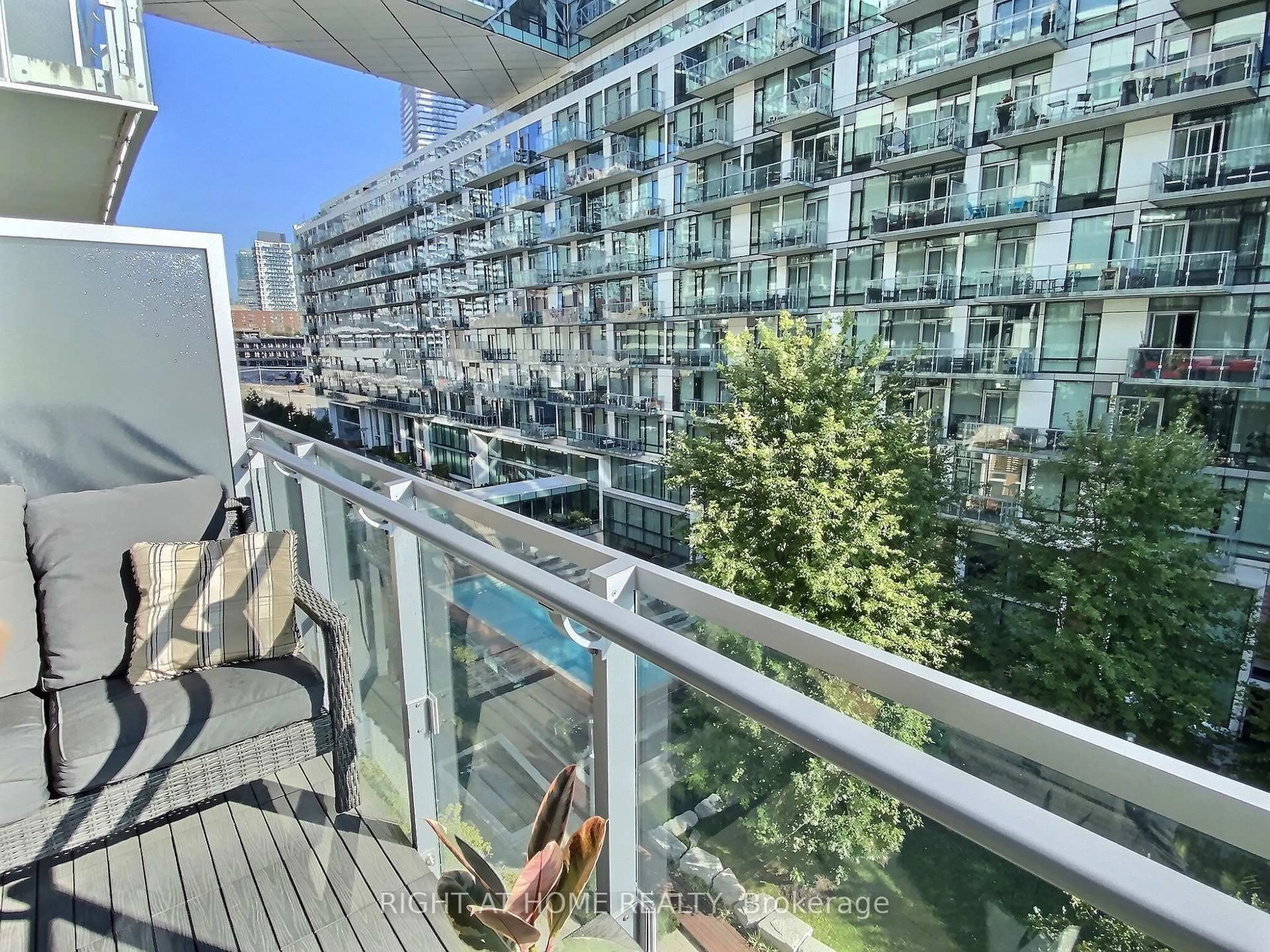 Balcony in the apartment, city buildings view from balcony for 39 Queens Quay #515, Toronto Ontario M5E 0A5