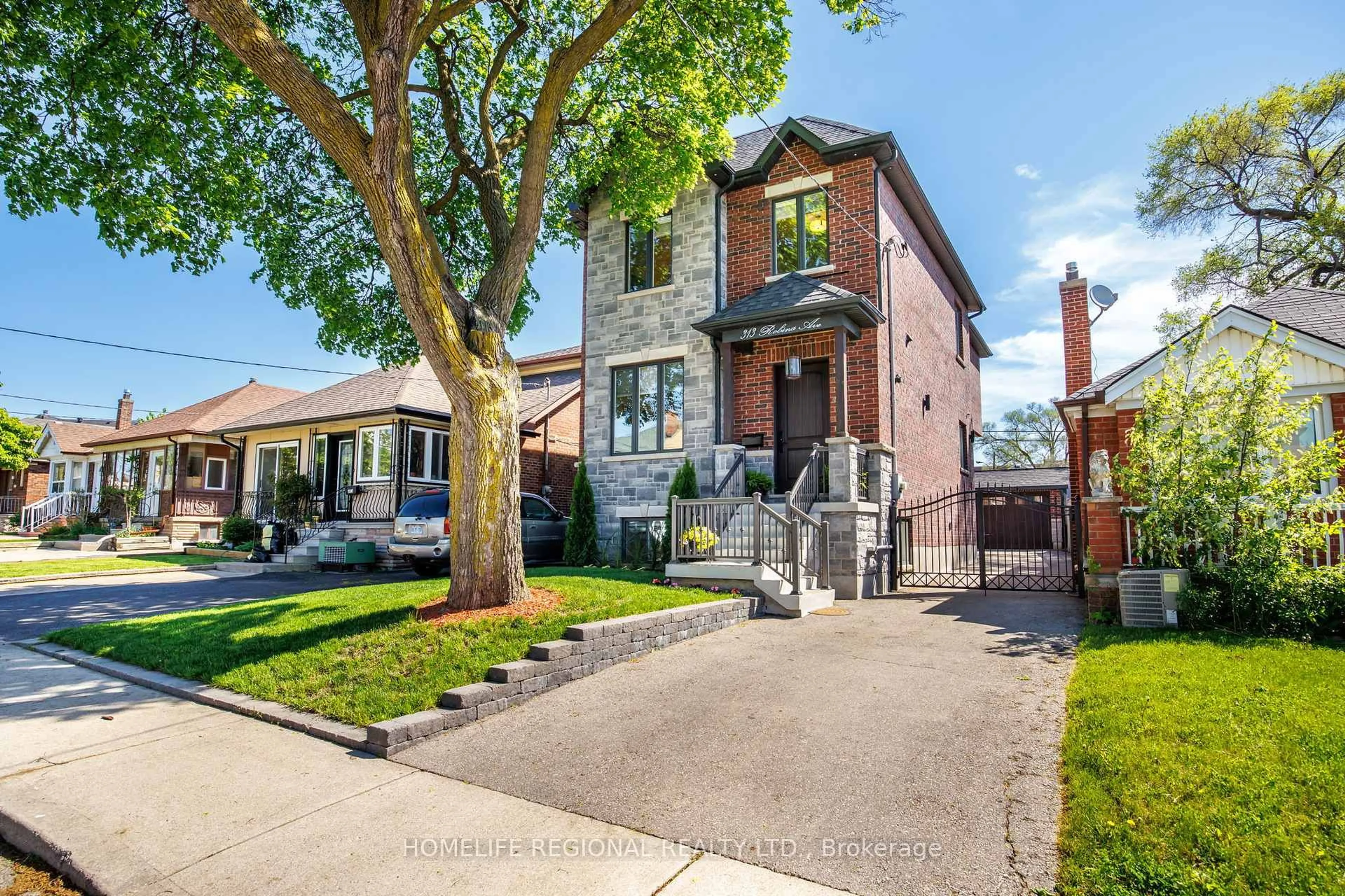 Home with brick exterior material, street for 313 Robina Ave, Toronto Ontario M6C 3Z2