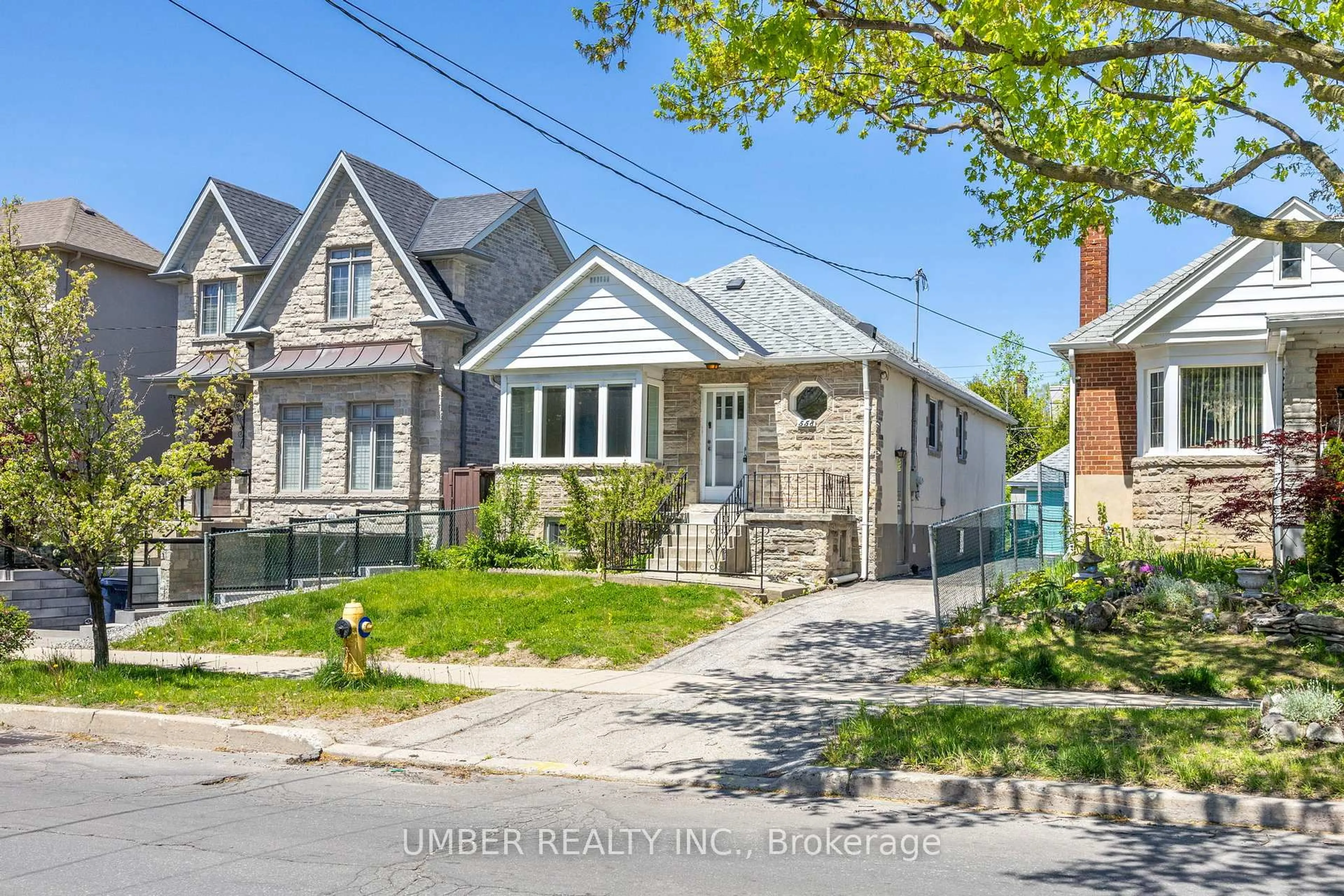 Home with brick exterior material, street for 558 Glencairn Ave, Toronto Ontario M6B 1Z4