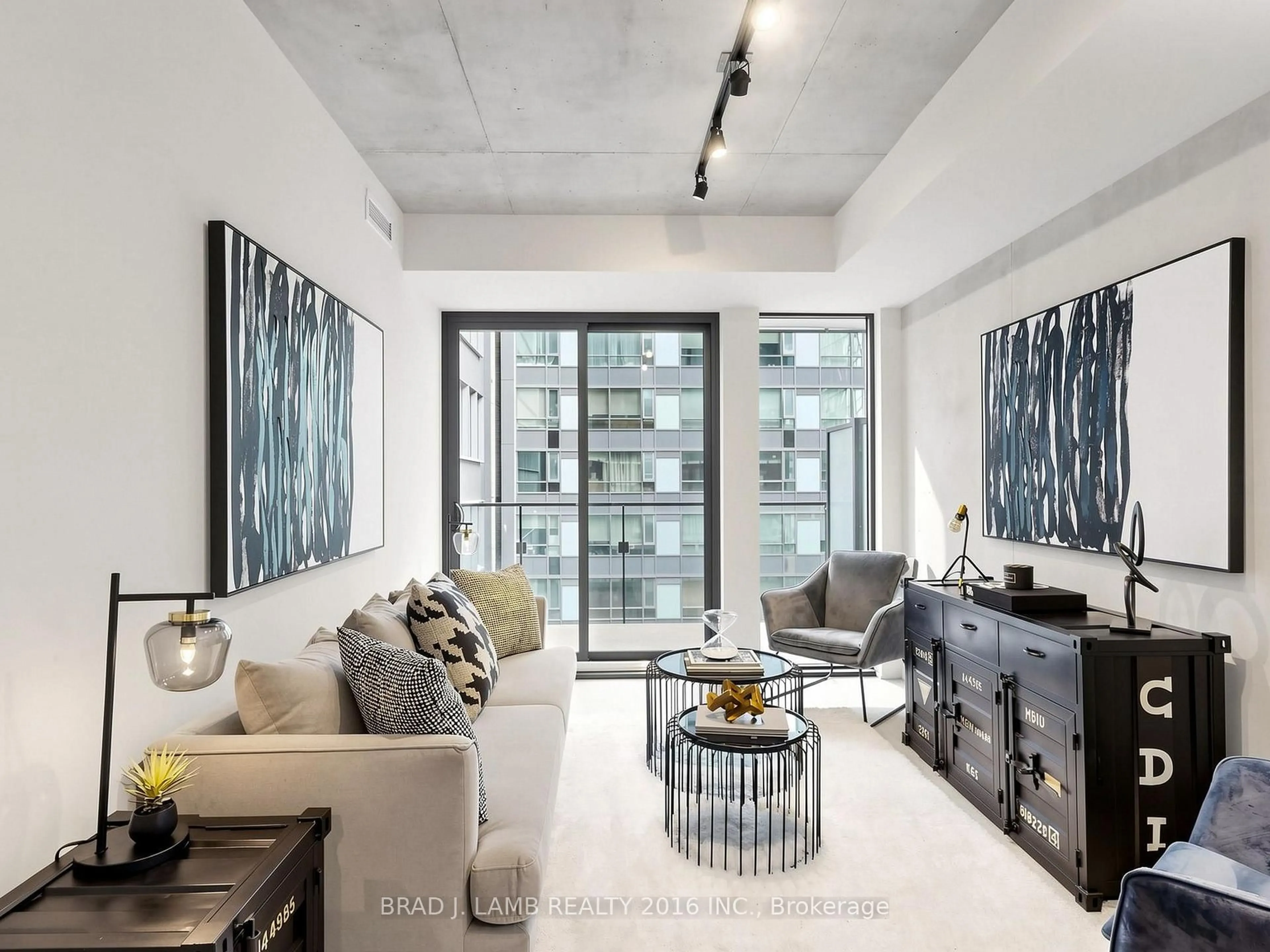 Living room with furniture, cement floor for 284 King St #505, Toronto Ontario M5A 1K4
