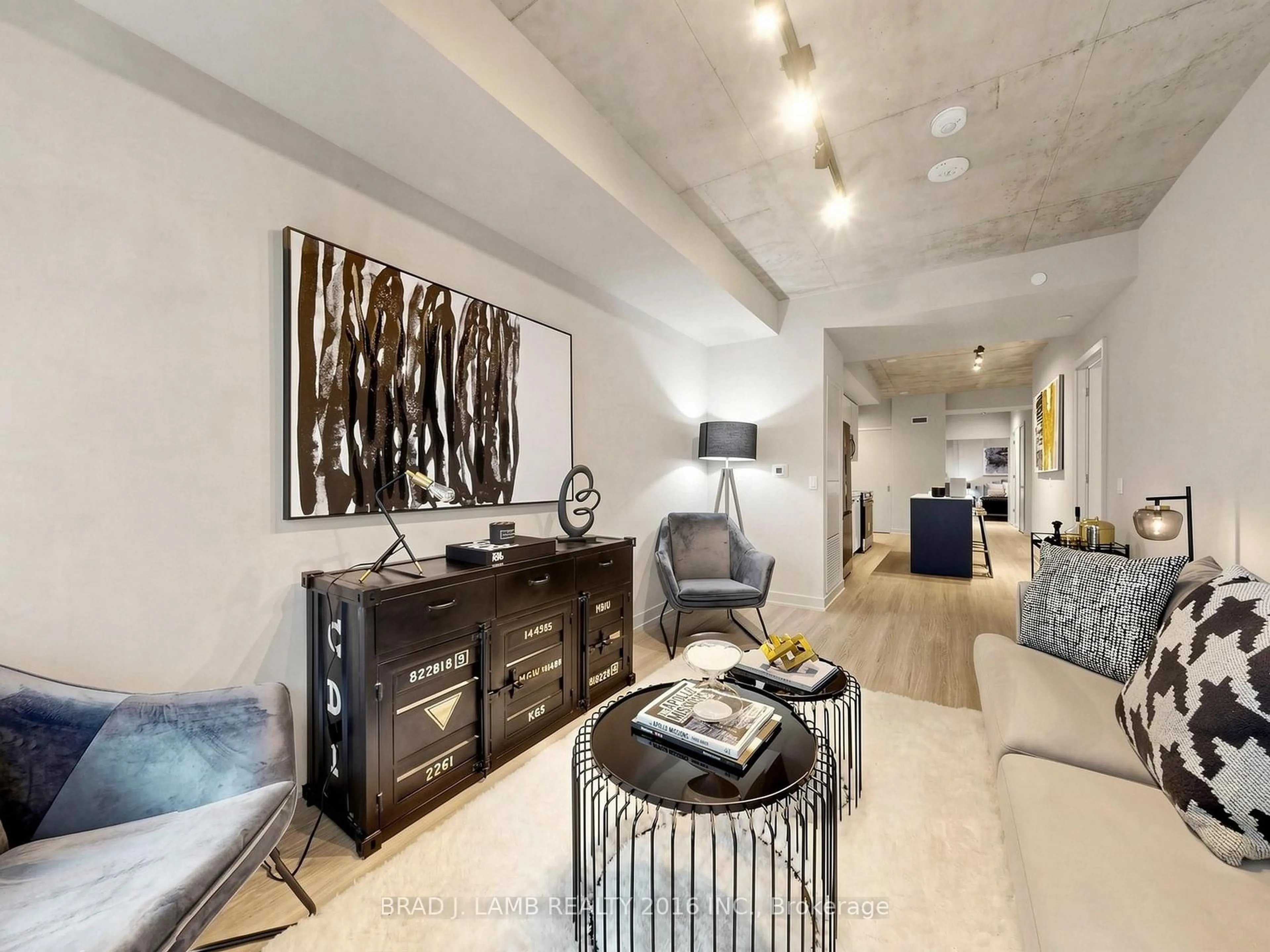 Living room with furniture, cement floor for 284 King St #505, Toronto Ontario M5A 1K4