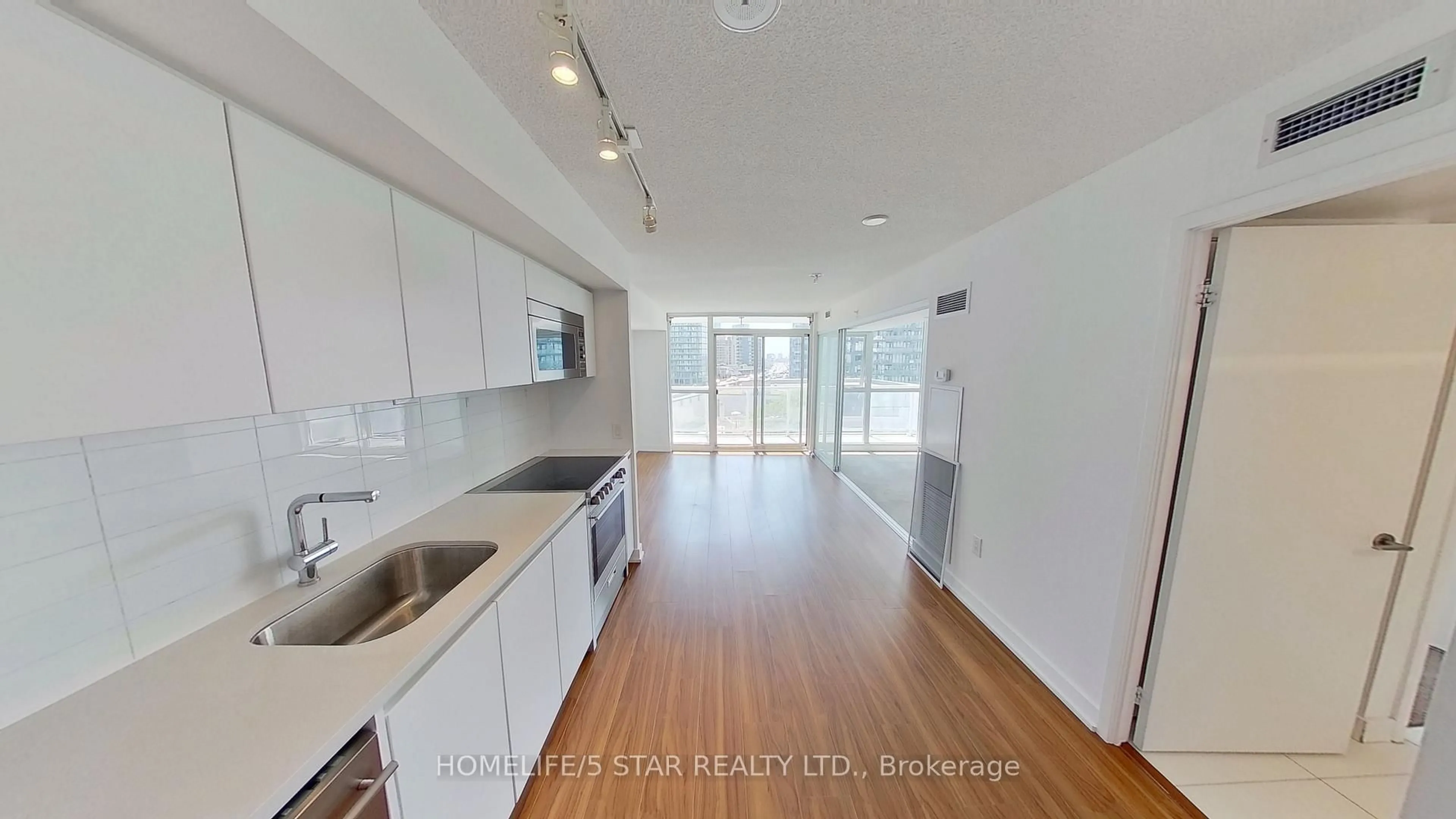 Open concept kitchen, unknown for 75 QUEENS WHARF Rd #910, Toronto Ontario M5V 0J8