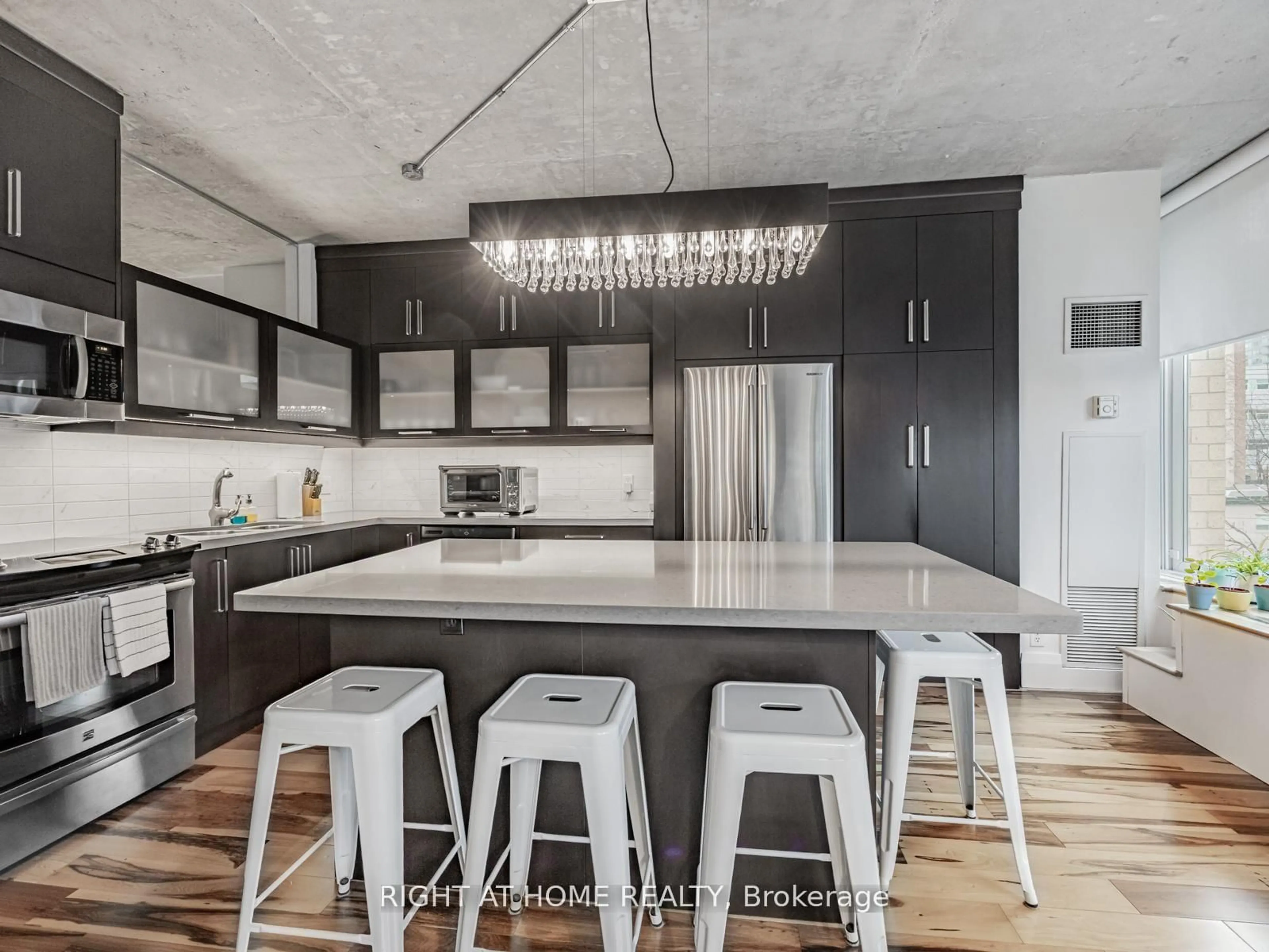 Contemporary kitchen, cement floor for 50 Camden St #405, Toronto Ontario M5V 3N1