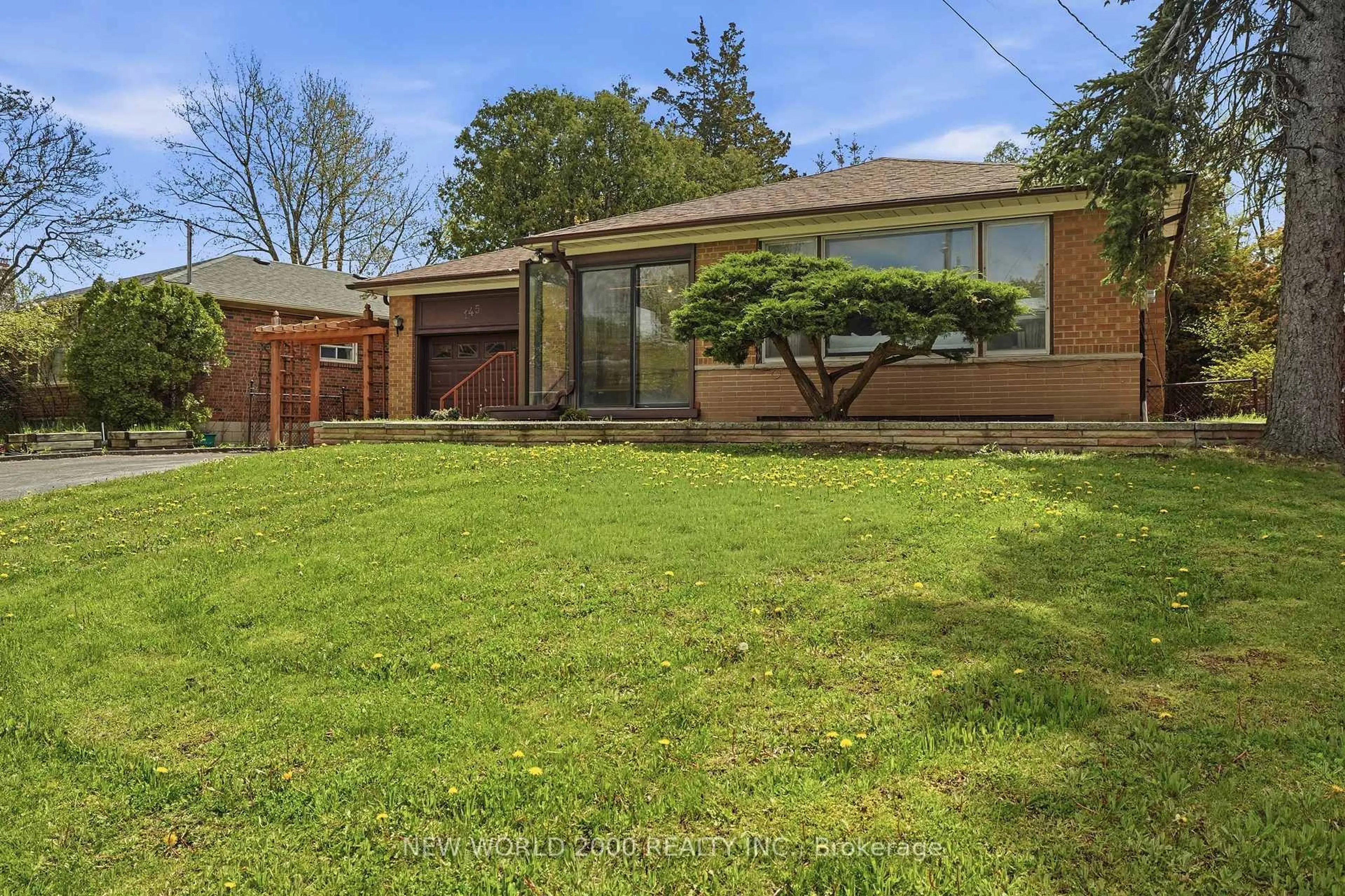 A pic from outside/outdoor area/front of a property/back of a property/a pic from drone, street for 145 Elvaston Dr, Toronto Ontario M4A 1N8