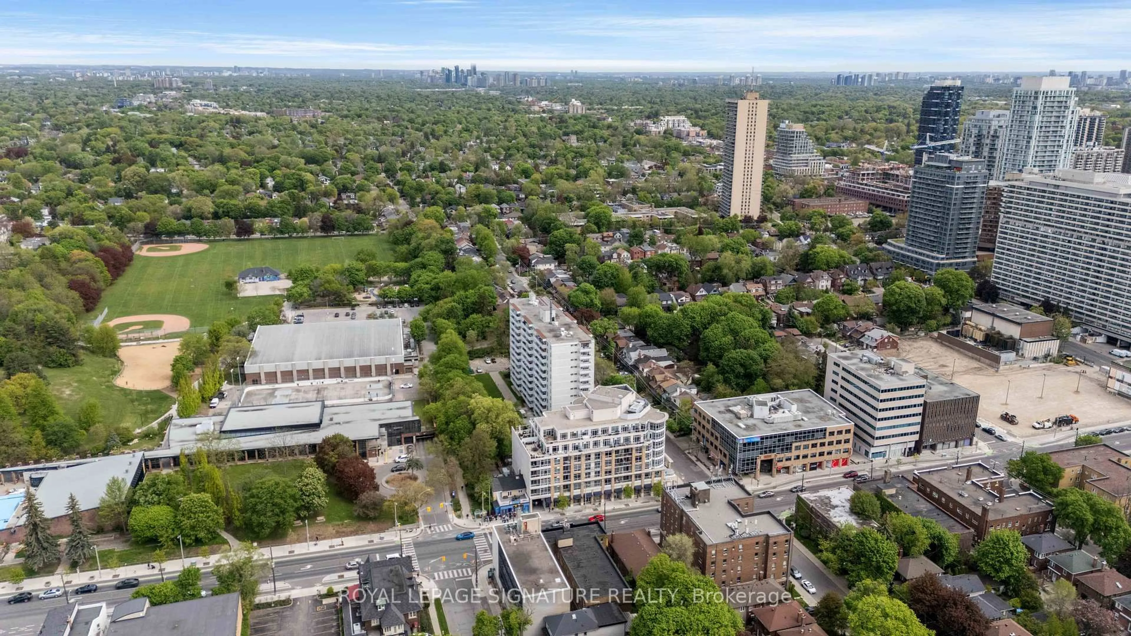 A pic from outside/outdoor area/front of a property/back of a property/a pic from drone, city buildings view from balcony for 2 Edith Dr #307, Toronto Ontario M4R 2H7