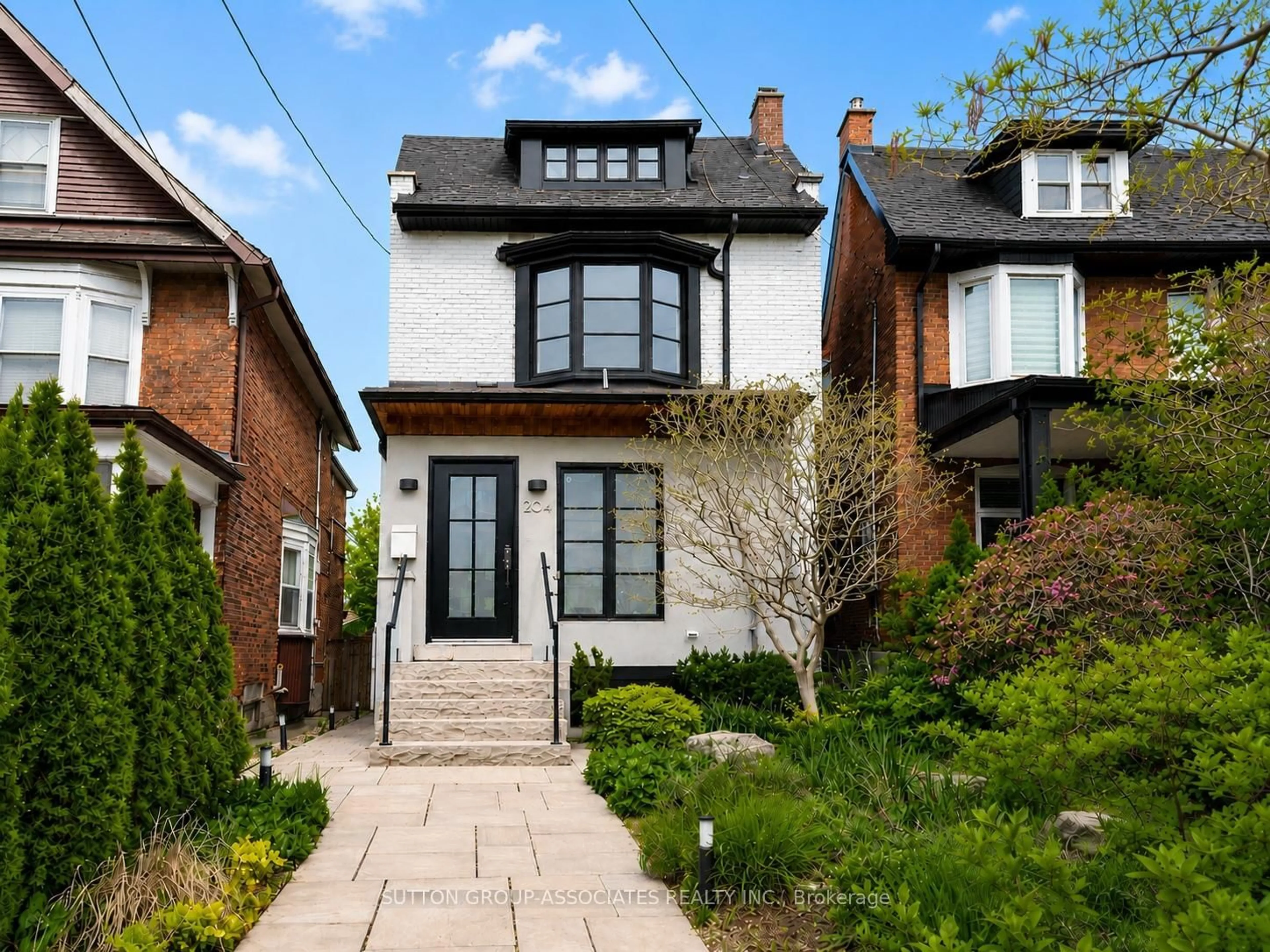 Home with brick exterior material, street for 204 Beatrice St, Toronto Ontario M6G 3G1