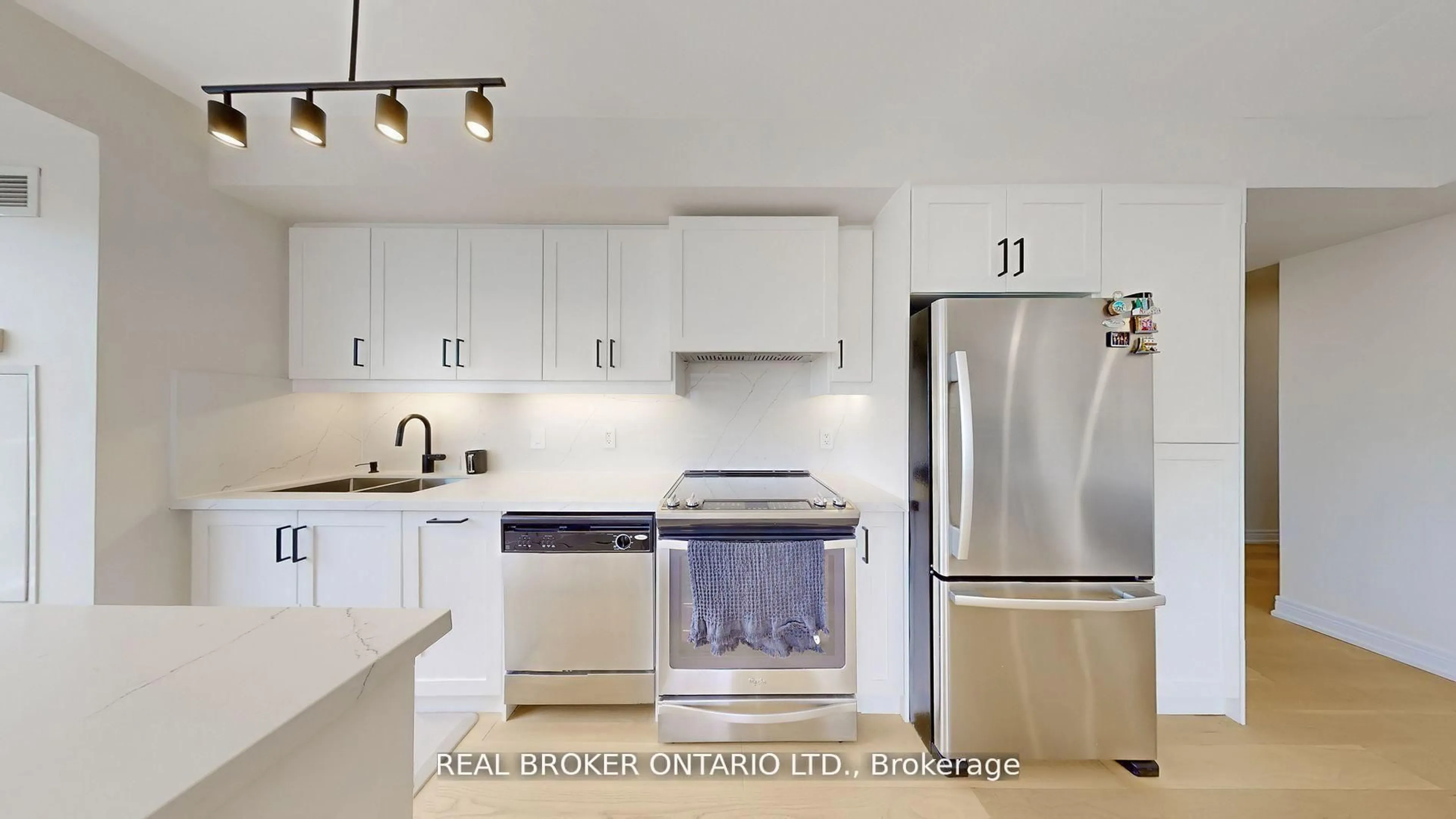 Open concept kitchen, ceramic/tile floor for 701 Sheppard Ave #415, Toronto Ontario M3H 0B2