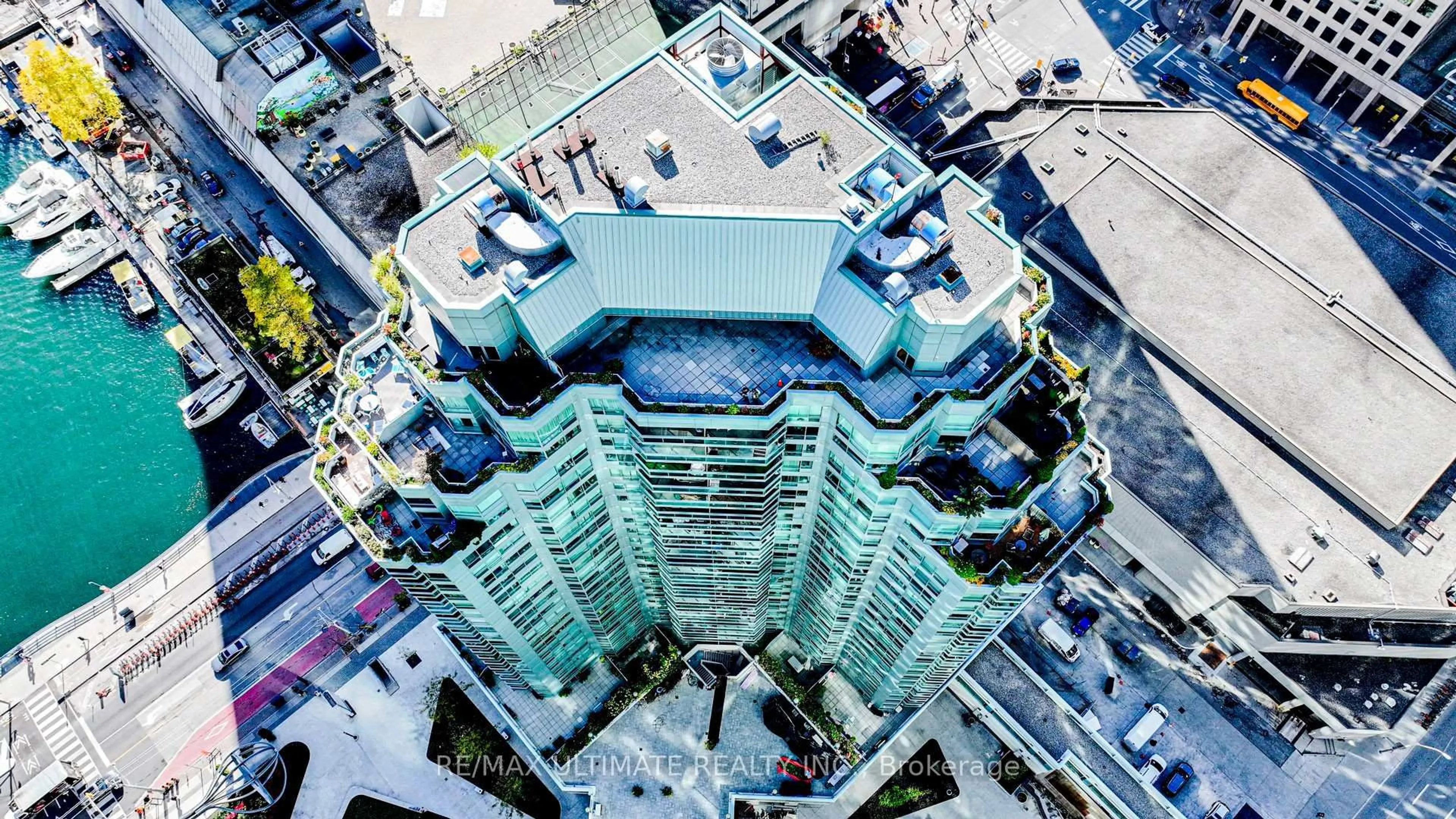 A pic from outside/outdoor area/front of a property/back of a property/a pic from drone, city buildings view from balcony for 10 Queens Quay #2206, Toronto Ontario M5J 2R9