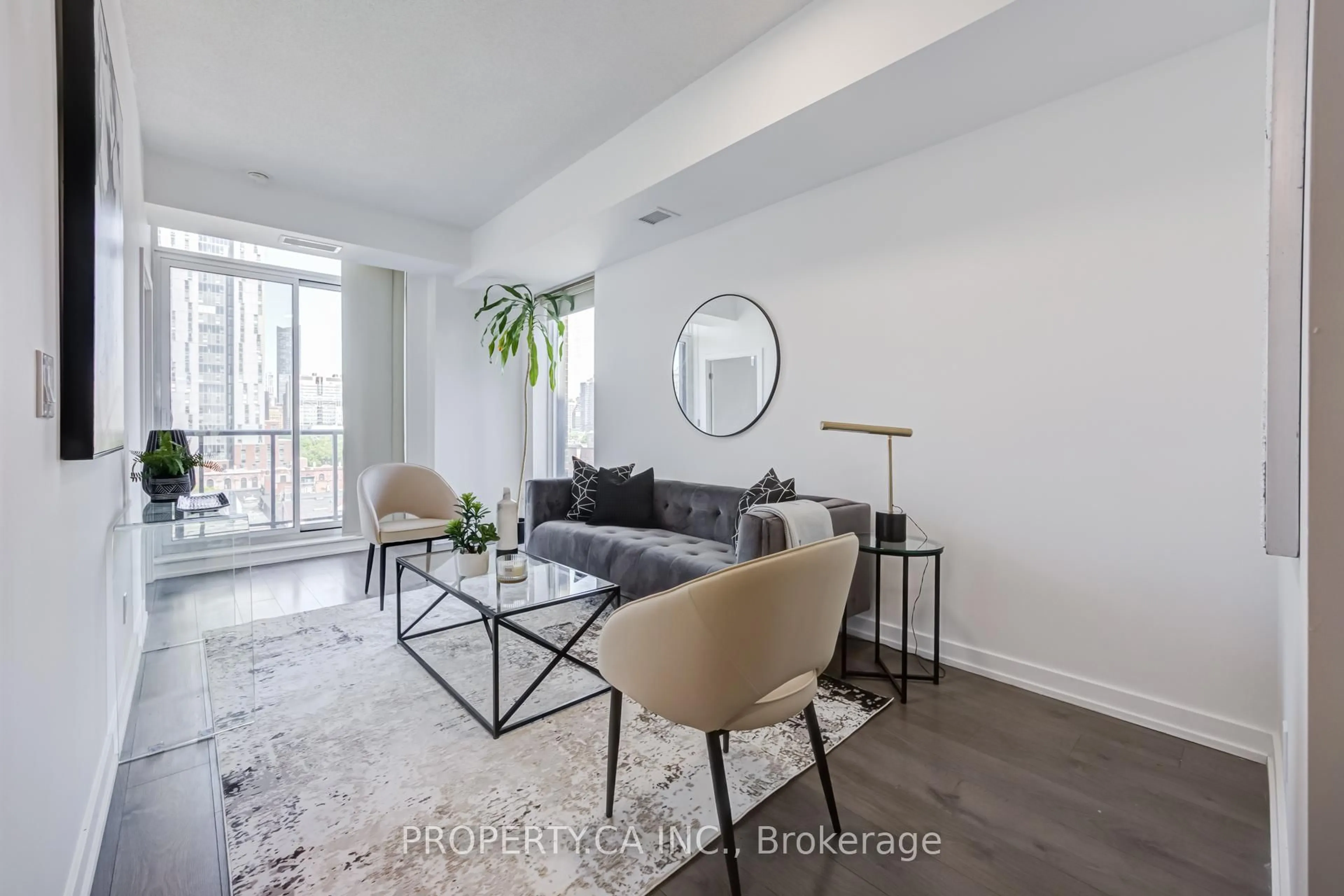 Living room with furniture, unknown for 297 College St #707, Toronto Ontario M5T 0C2