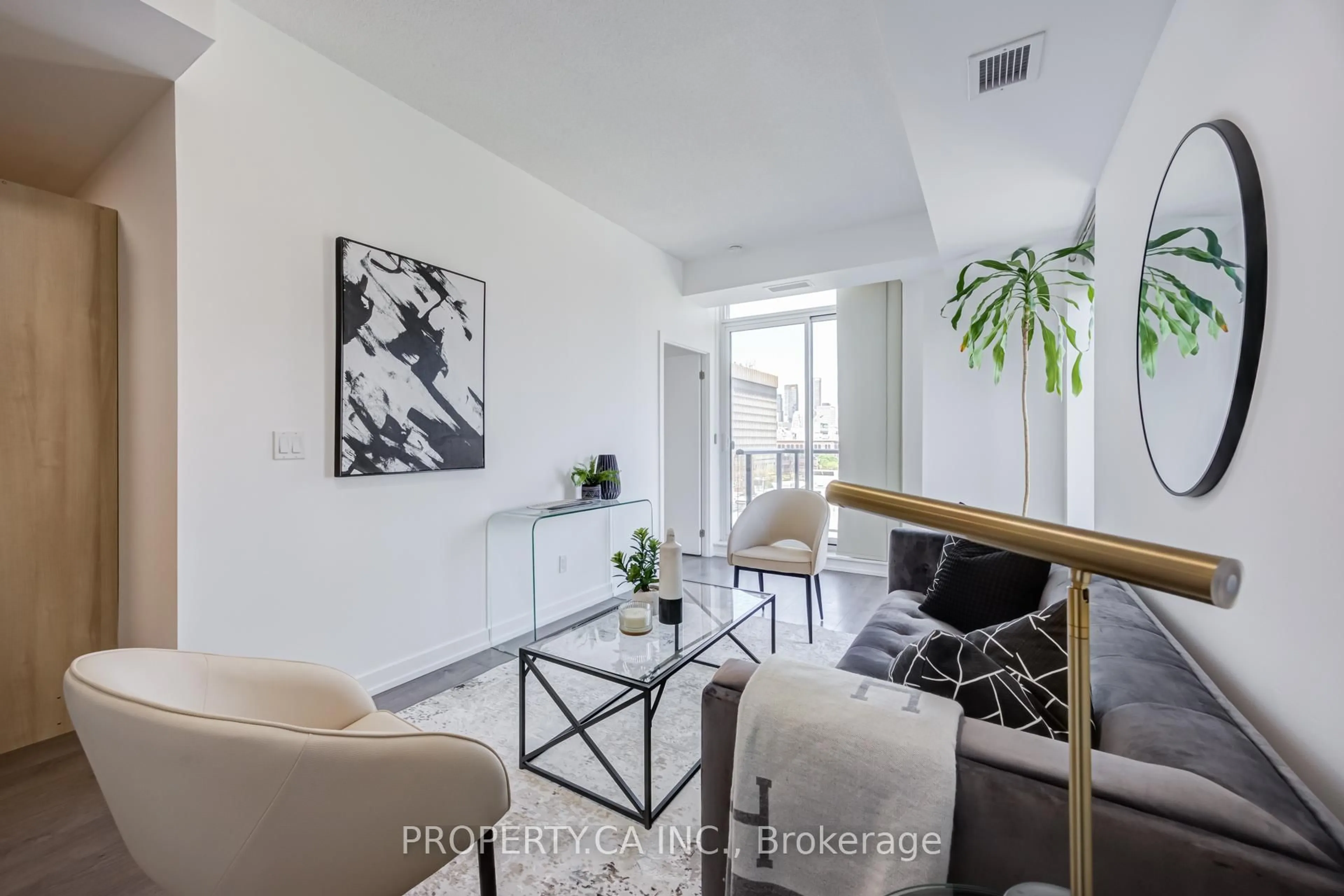 Living room with furniture, unknown for 297 College St #707, Toronto Ontario M5T 0C2