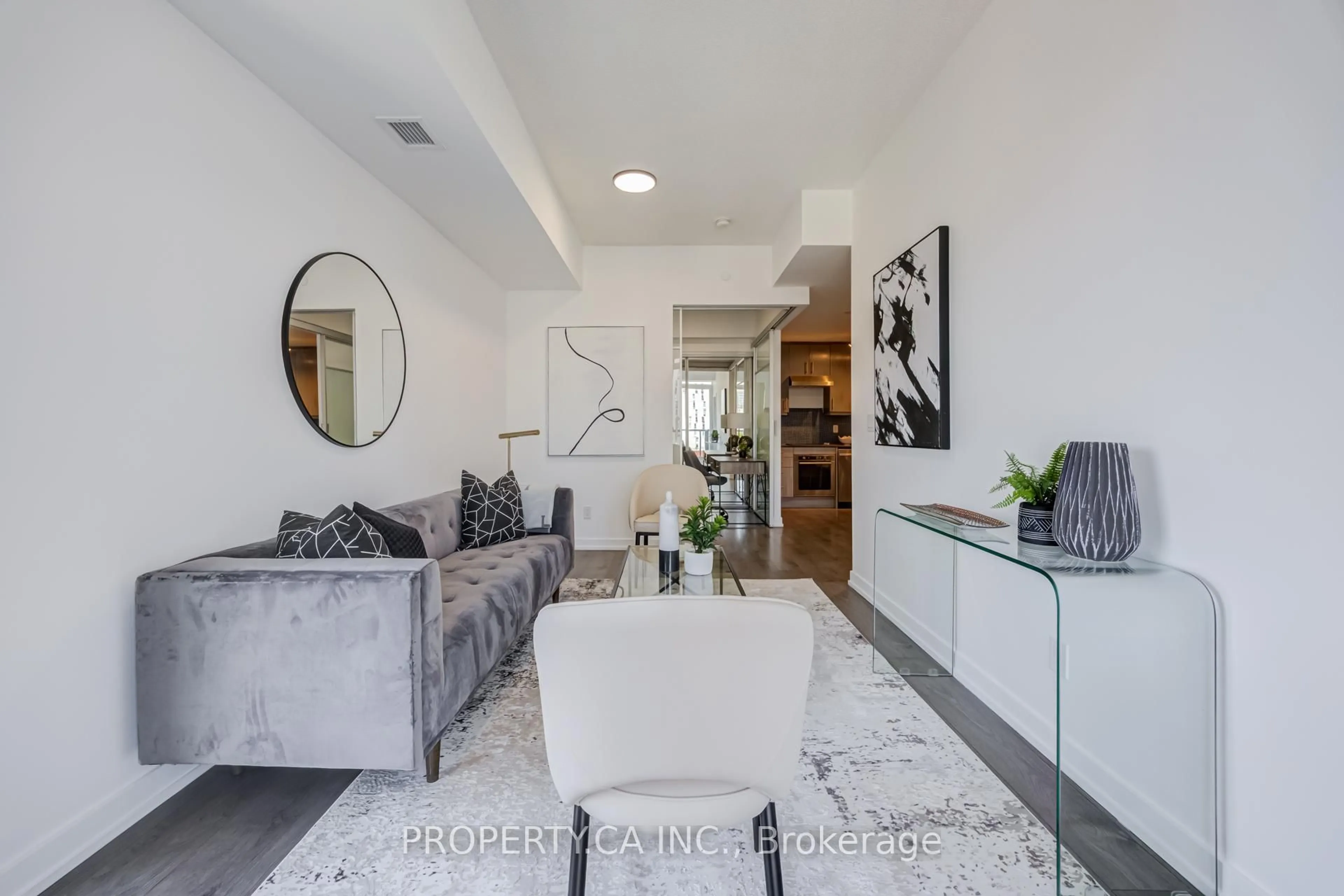 Living room with furniture, unknown for 297 College St #707, Toronto Ontario M5T 0C2