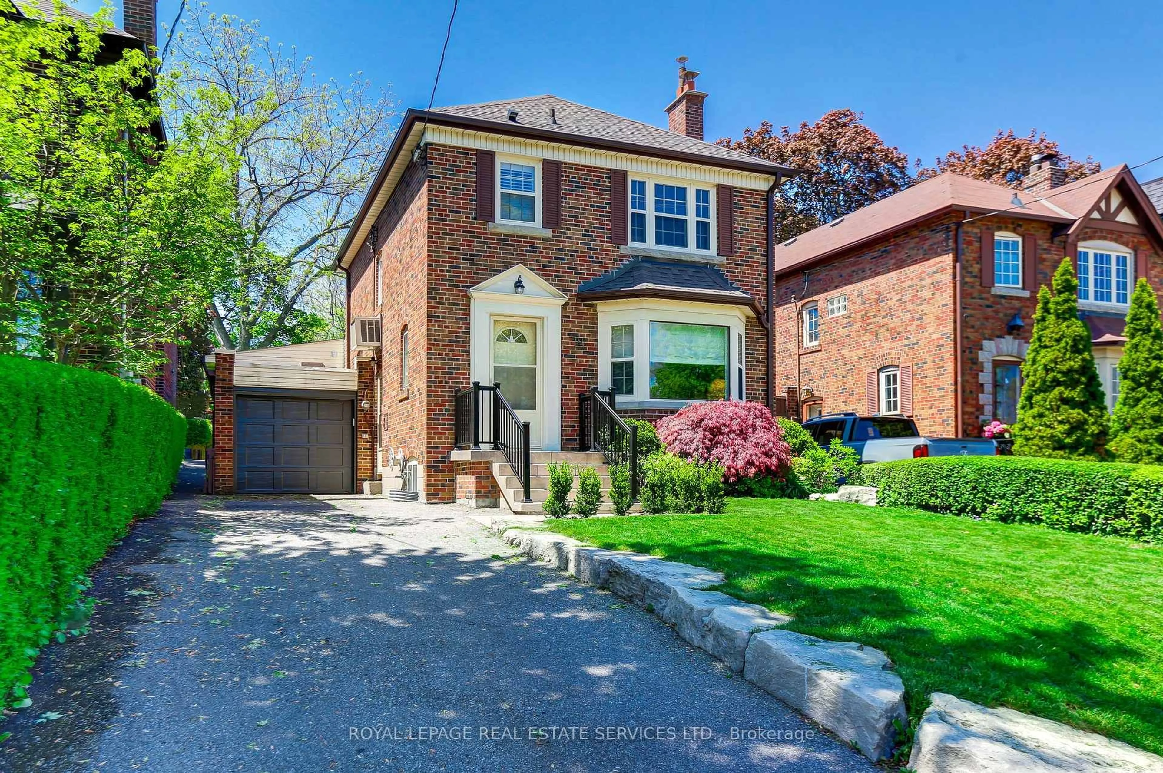 Home with brick exterior material, street for 24 Tanager Ave, Toronto Ontario M4G 3R1