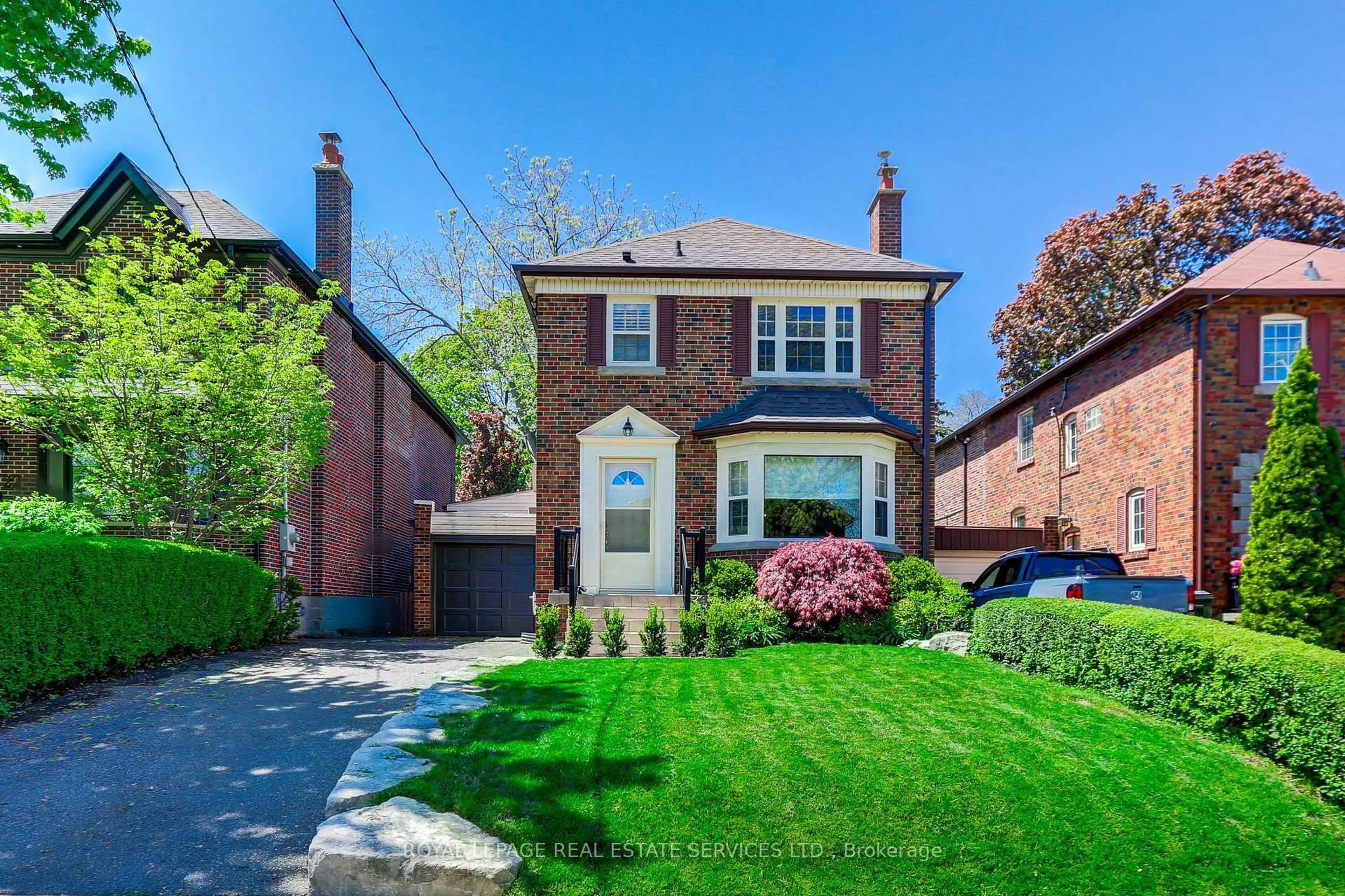 Home with brick exterior material, street for 24 Tanager Ave, Toronto Ontario M4G 3R1