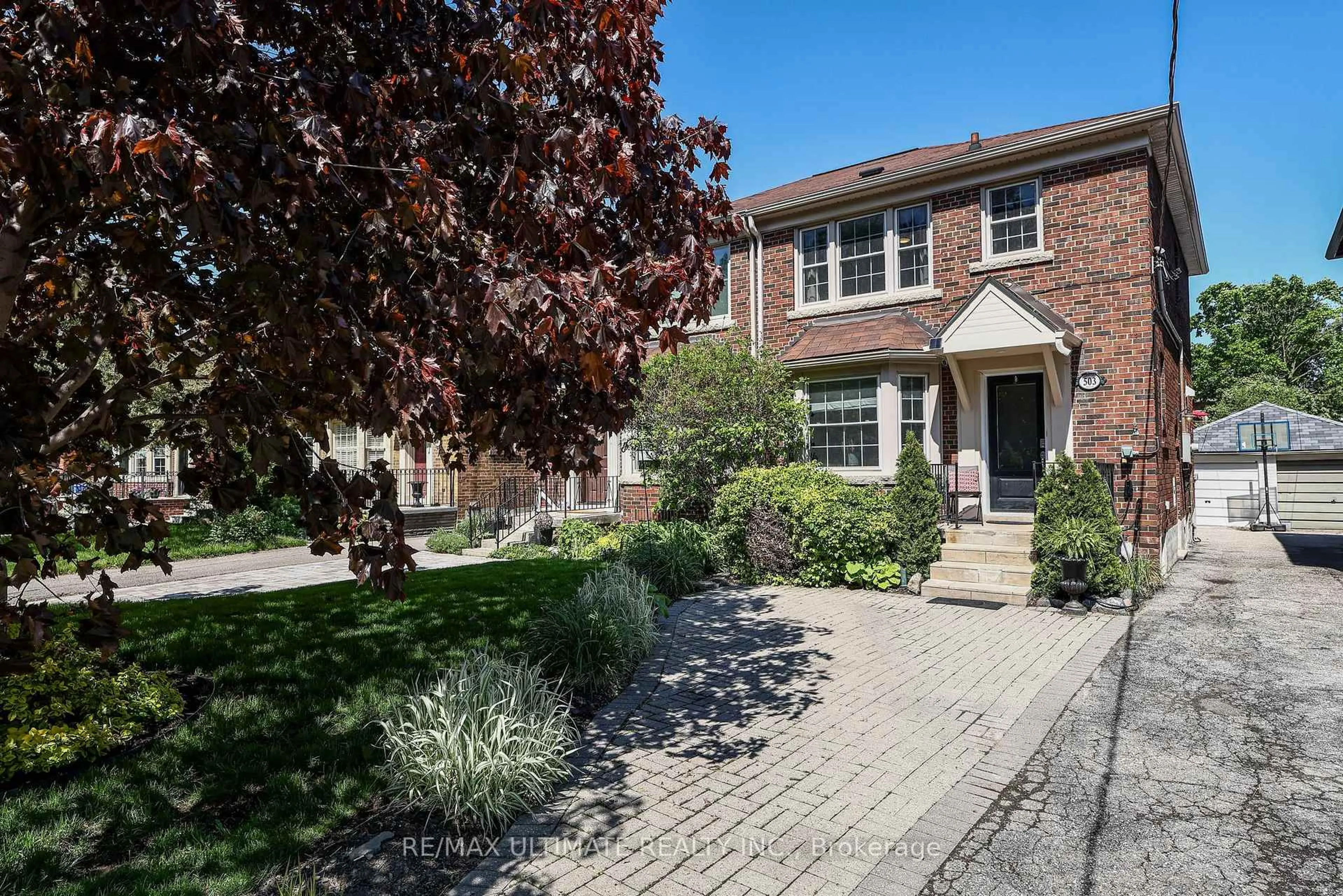 Home with brick exterior material, street for 503 Sutherland Dr, Toronto Ontario M4G 1K9