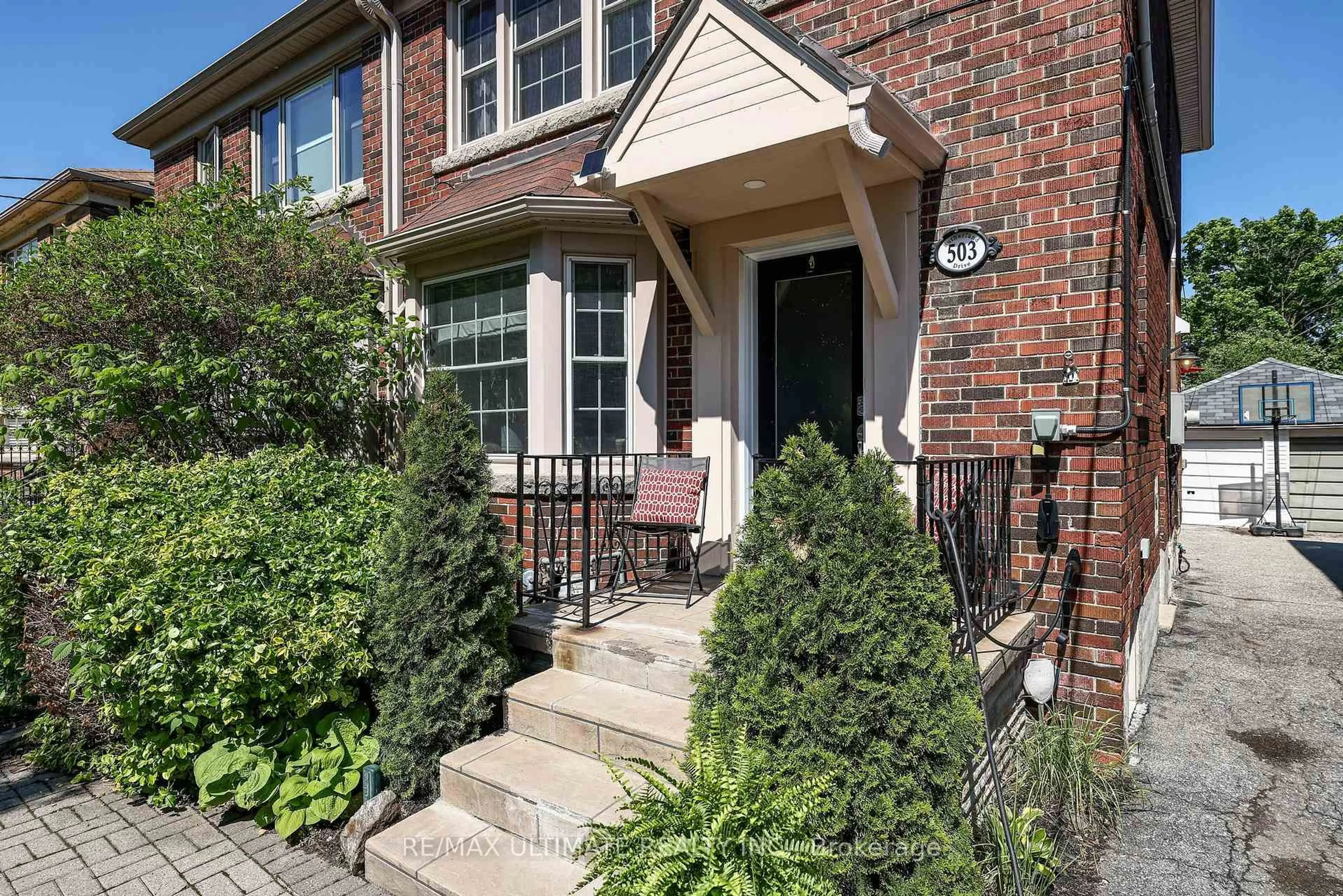 Home with brick exterior material, street for 503 Sutherland Dr, Toronto Ontario M4G 1K9