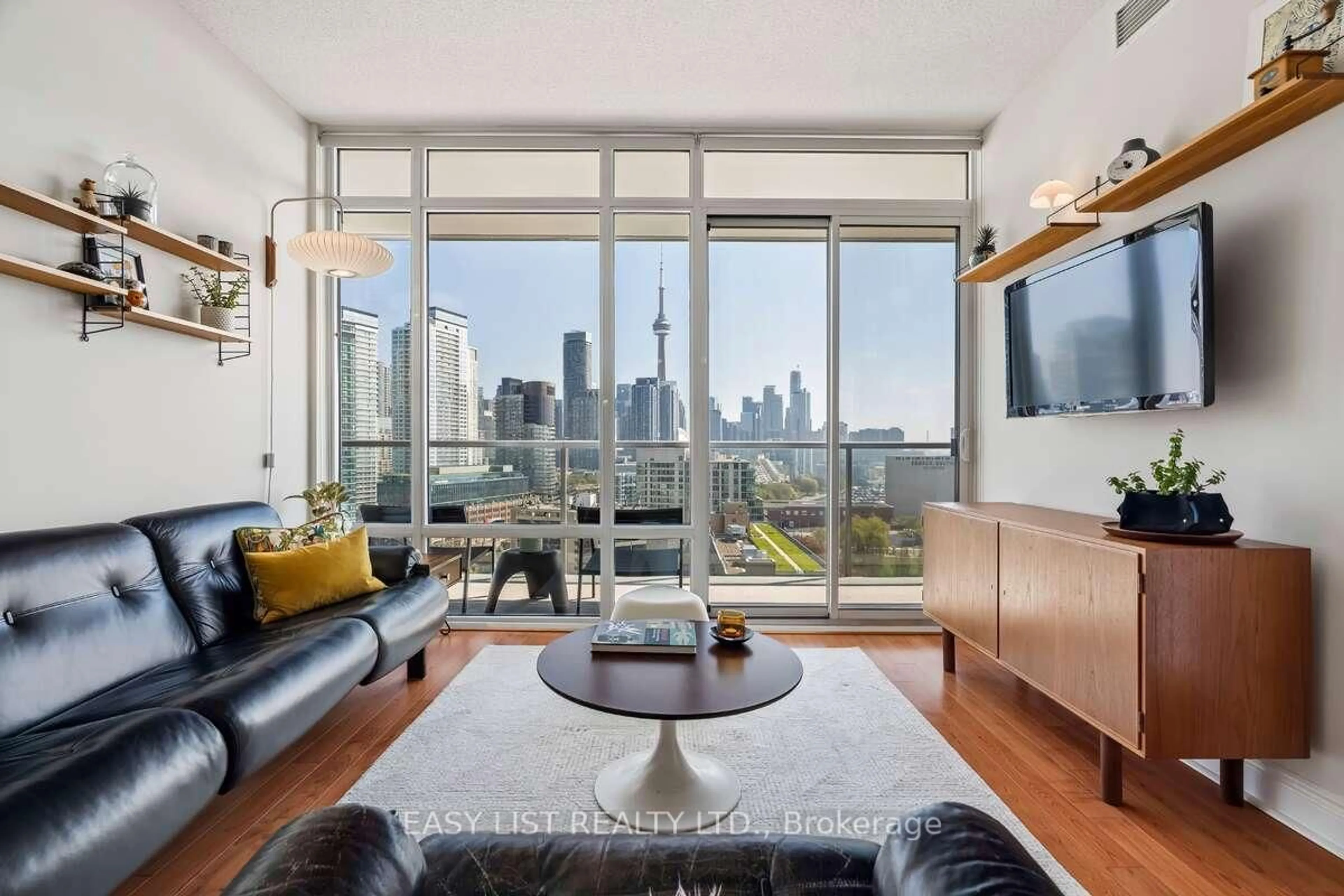Living room with furniture, unknown for 90 Stadium Rd #1701, Toronto Ontario M5V 3W5