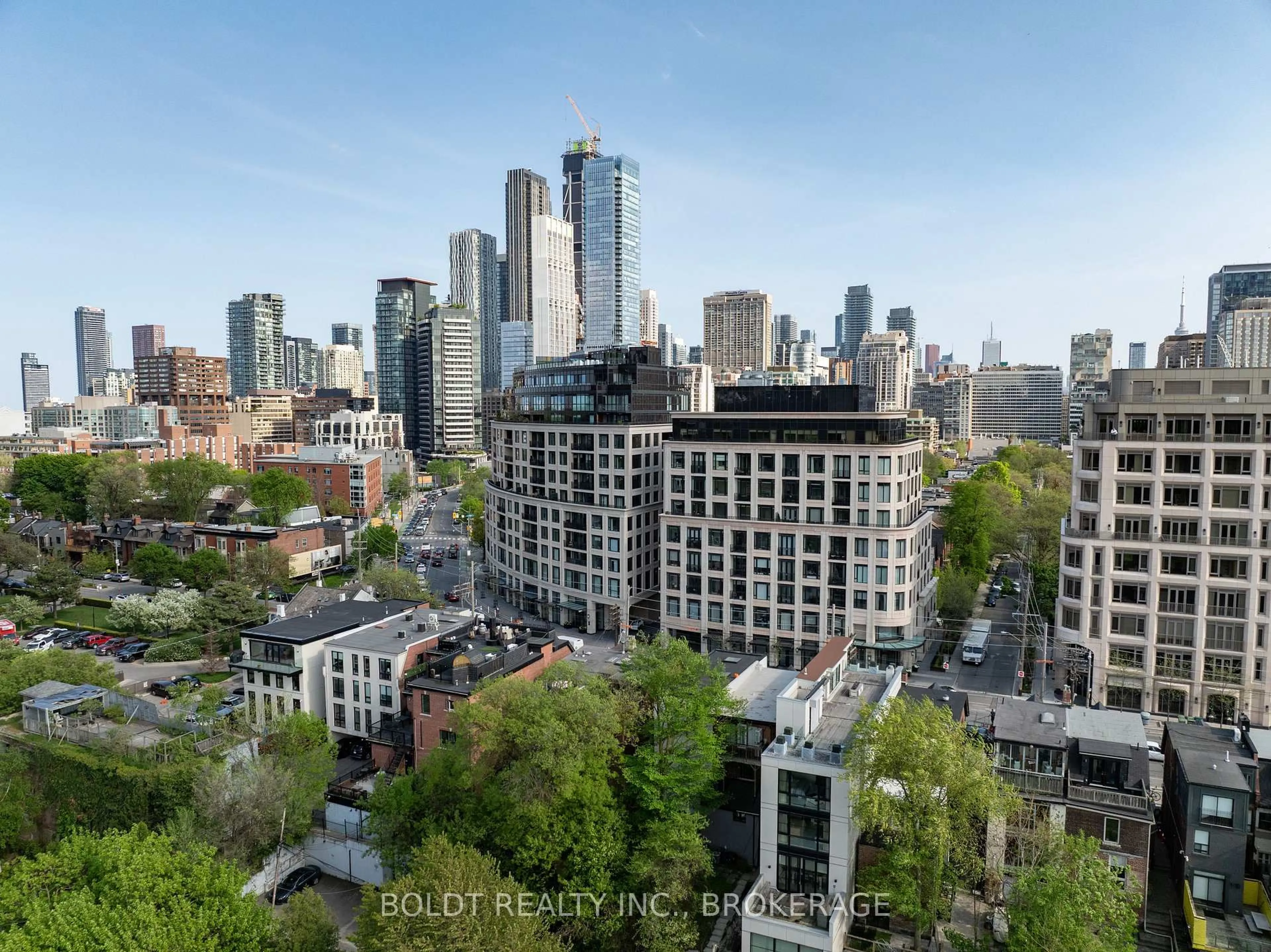 A pic from outside/outdoor area/front of a property/back of a property/a pic from drone, city buildings view from balcony for 181 Davenport Rd #702, Toronto Ontario M5R 1J1