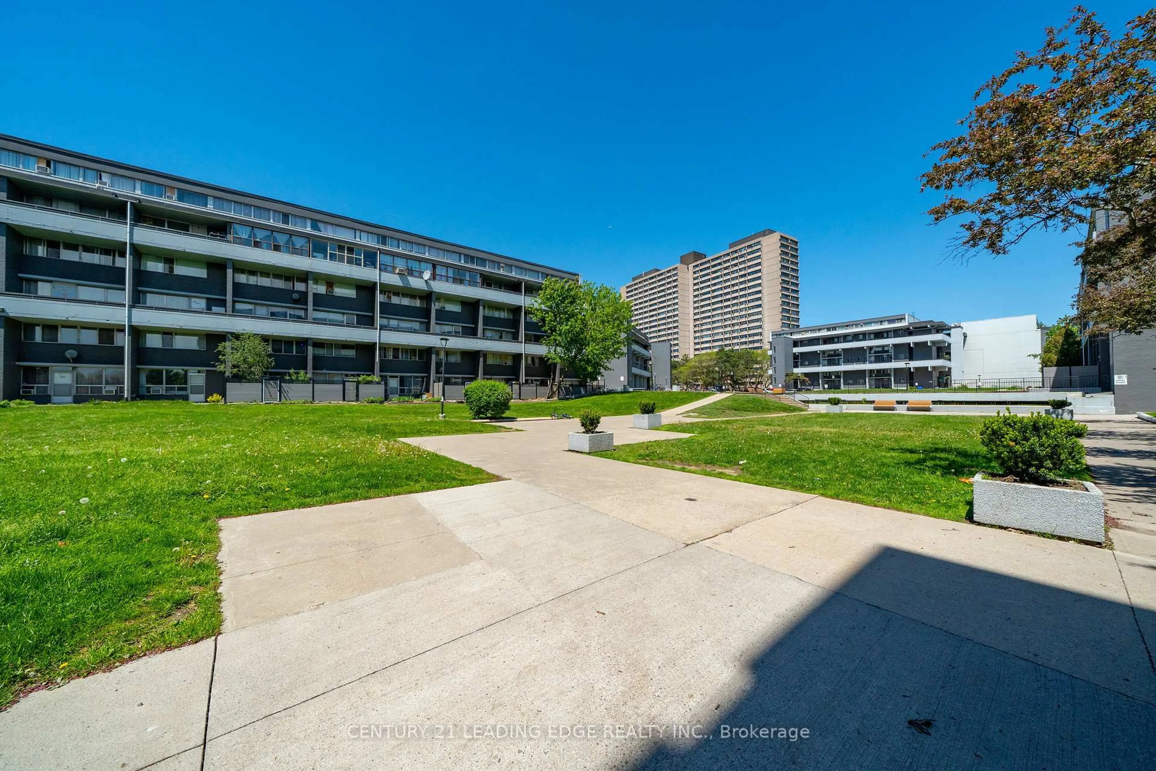 A pic from outside/outdoor area/front of a property/back of a property/a pic from drone, building for 55 Sunny Glwy #307, Toronto Ontario M3C 2Z5