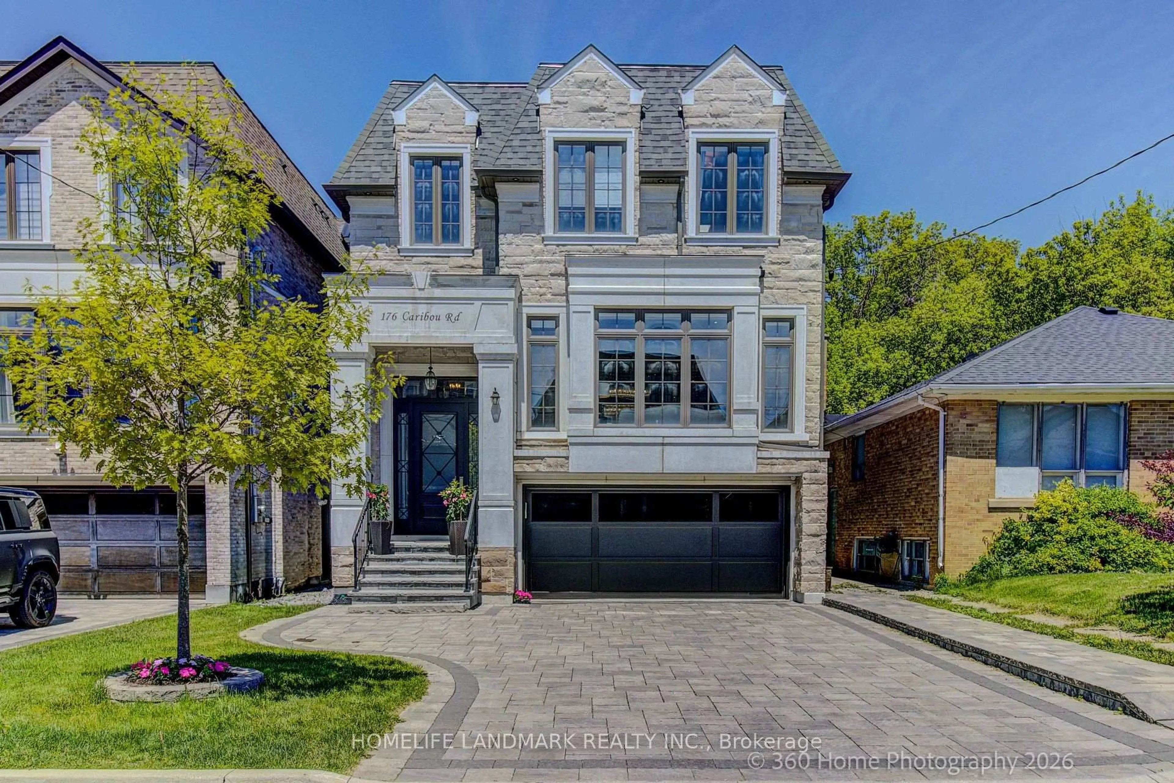 Home with brick exterior material, street for 176 Caribou Rd, Toronto Ontario M5N 2B6