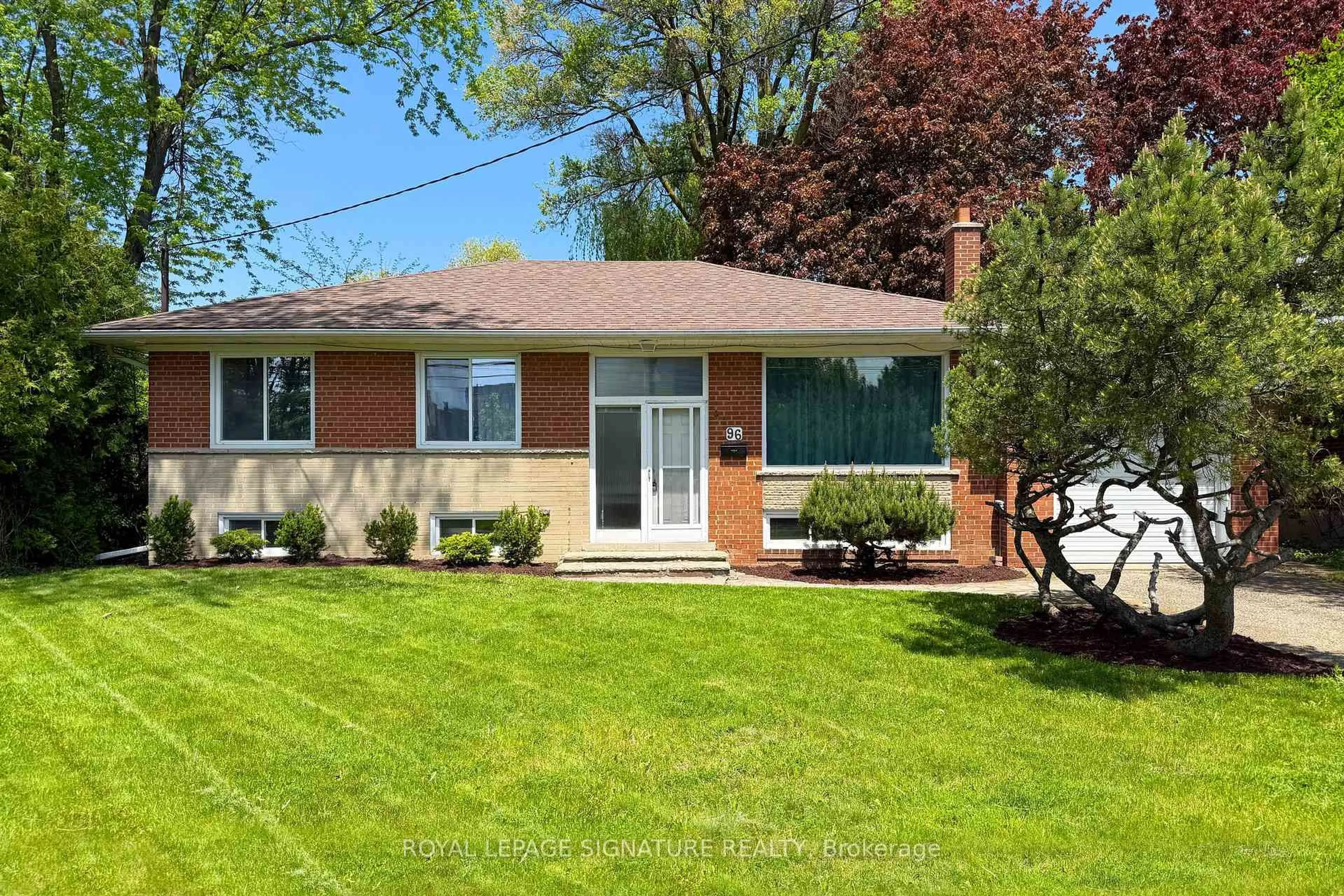Home with brick exterior material, street for 96 Elvaston Dr, Toronto Ontario M4A 1N6