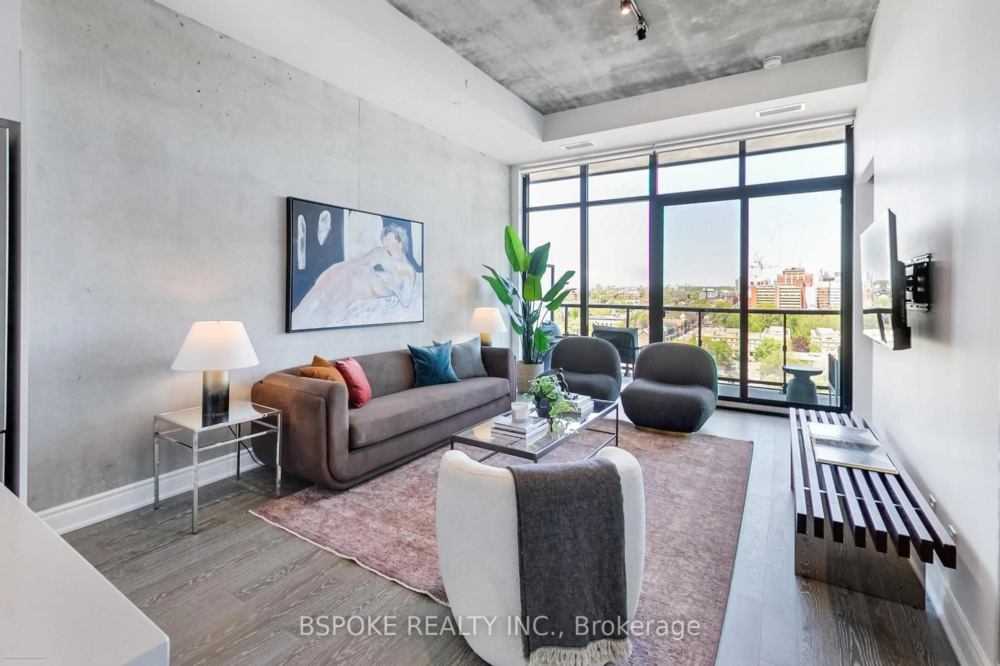 Living room with furniture, cement floor for 608 Richmond St #LPH9, Toronto Ontario M5V 0N9