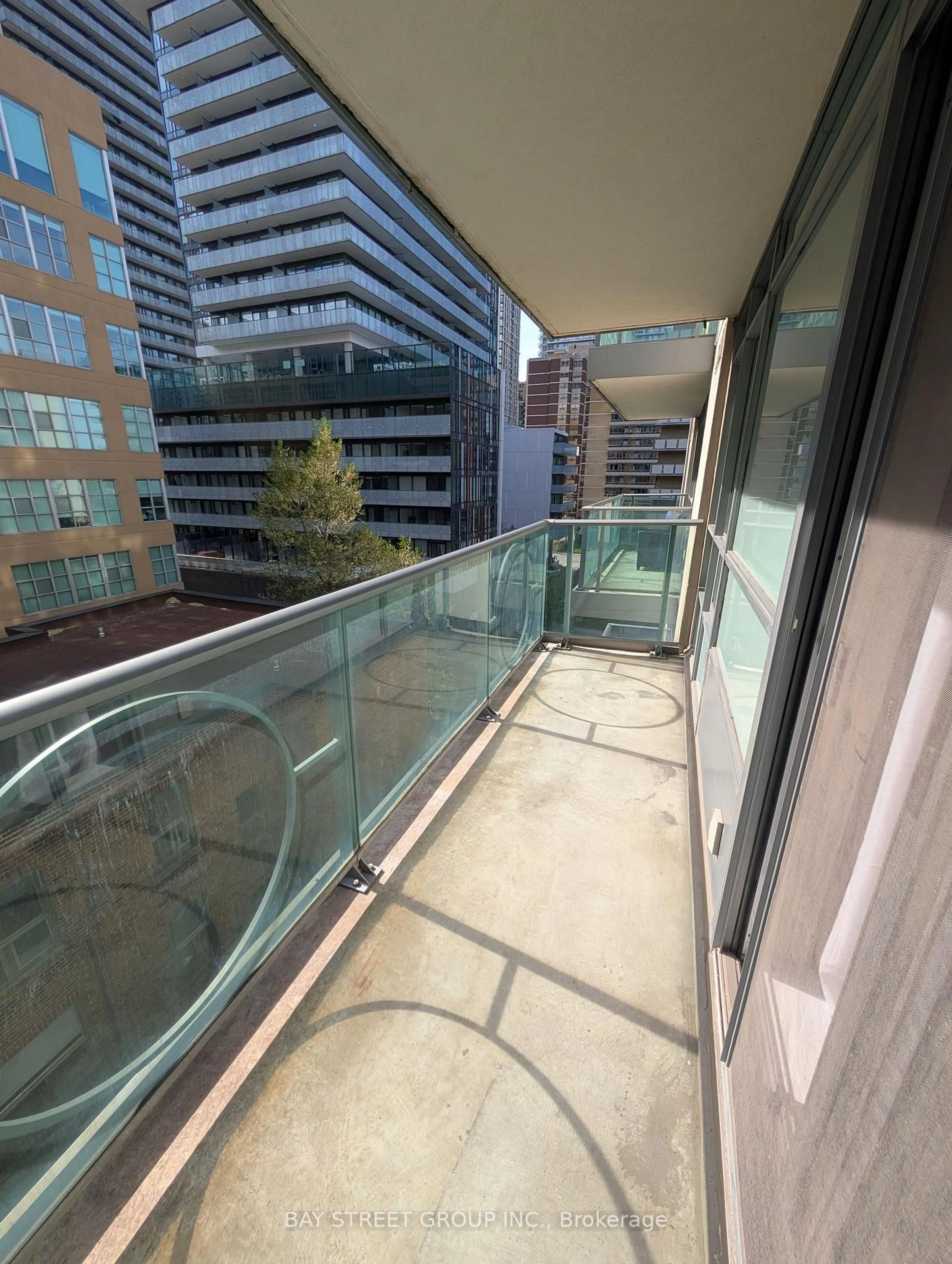 Balcony in the apartment, city buildings view from balcony for 212 Eglinton Ave #505, Toronto Ontario M4P 0A3