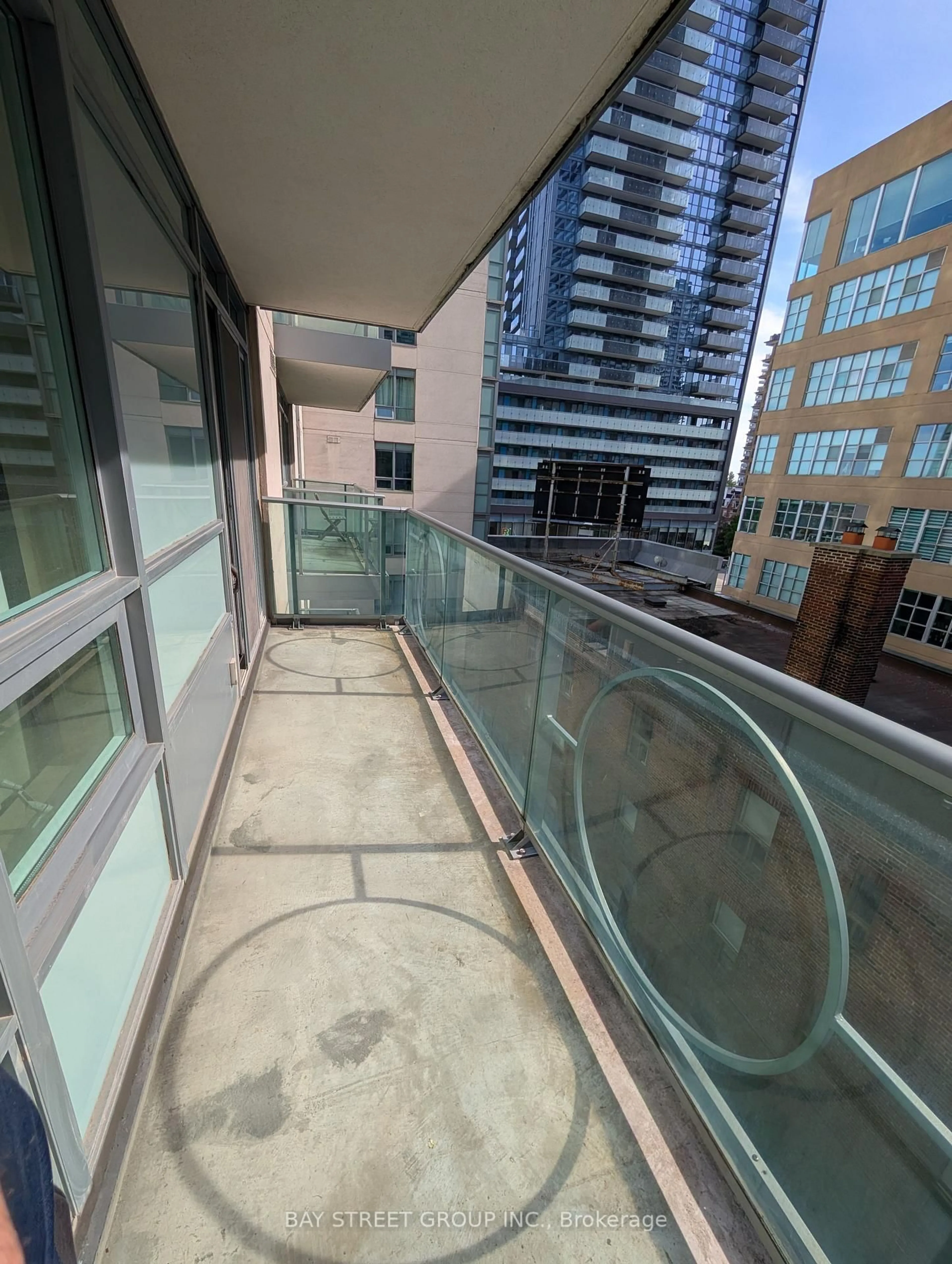 Balcony in the apartment, city buildings view from balcony for 212 Eglinton Ave #505, Toronto Ontario M4P 0A3