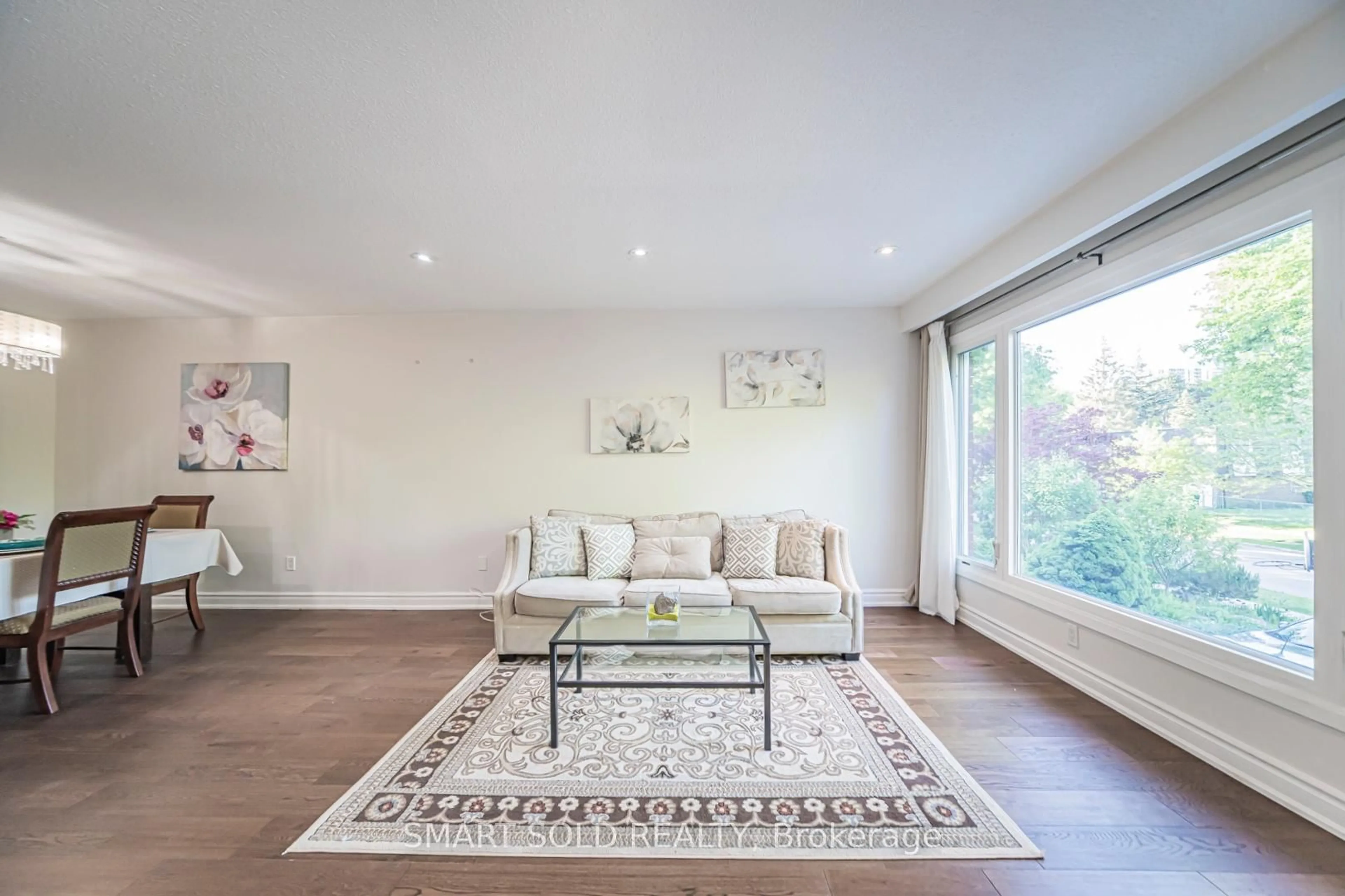 Living room with furniture, wood/laminate floor for 151 Silas Hill Dr, Toronto Ontario M2J 2X8