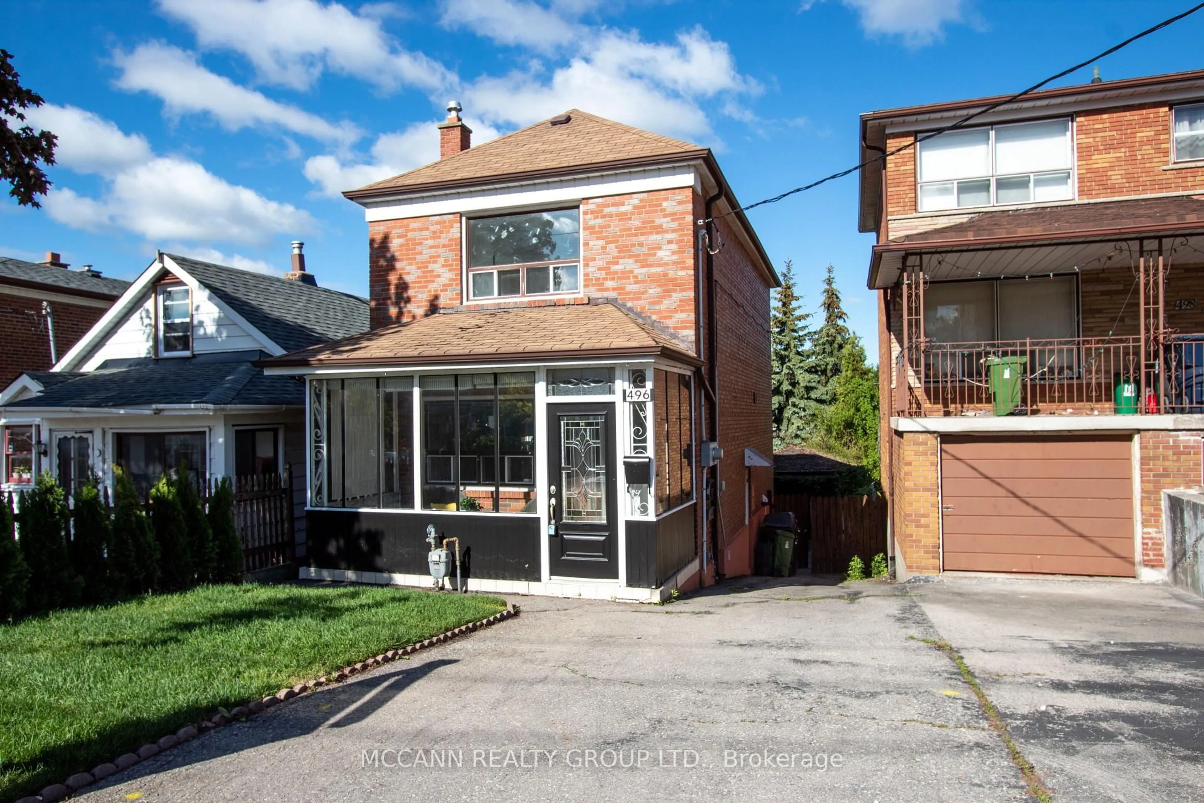 Home with brick exterior material, street for 496 Northcliffe Blvd, Toronto Ontario M6E 3L5