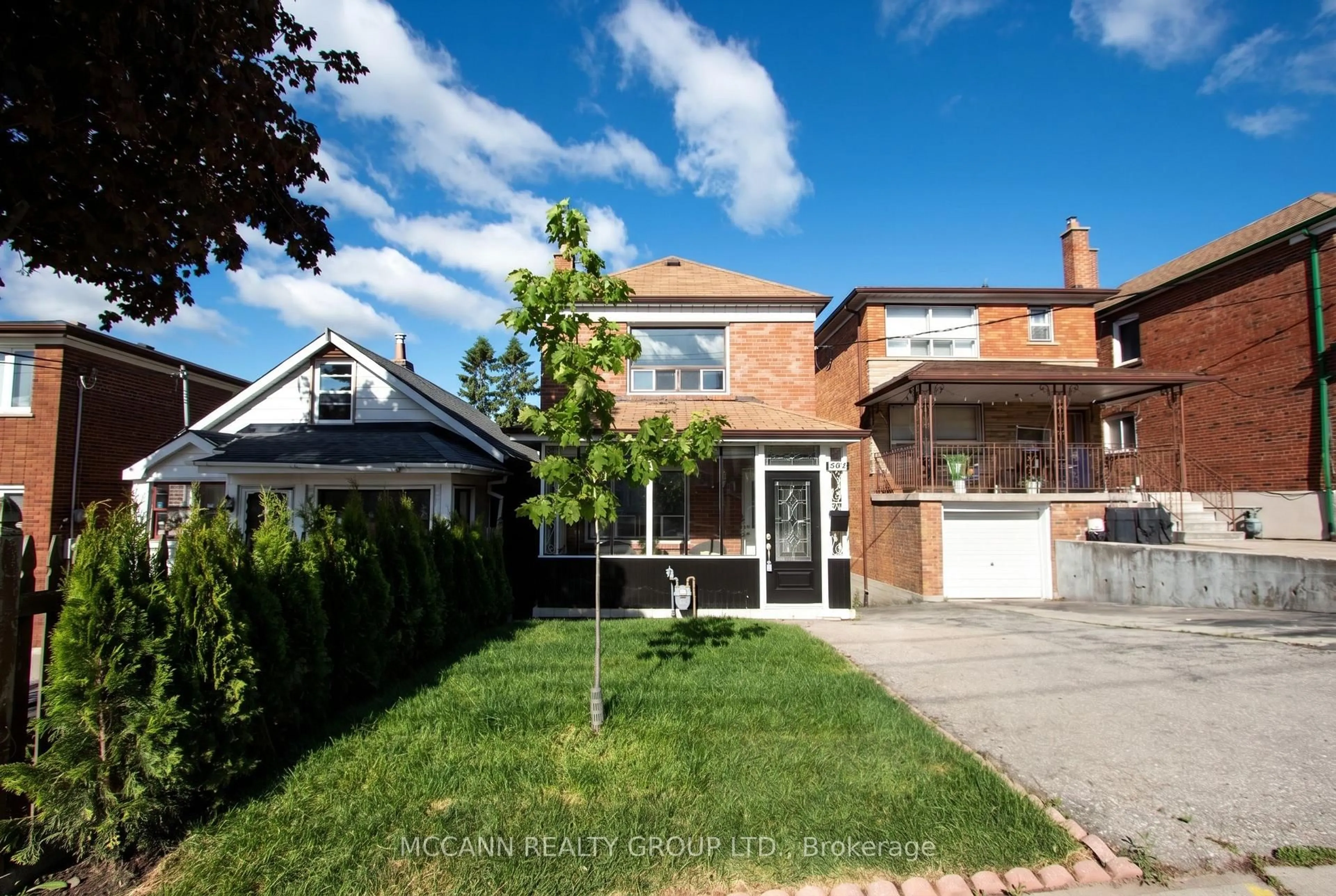 Home with brick exterior material, street for 496 Northcliffe Blvd, Toronto Ontario M6E 3L5