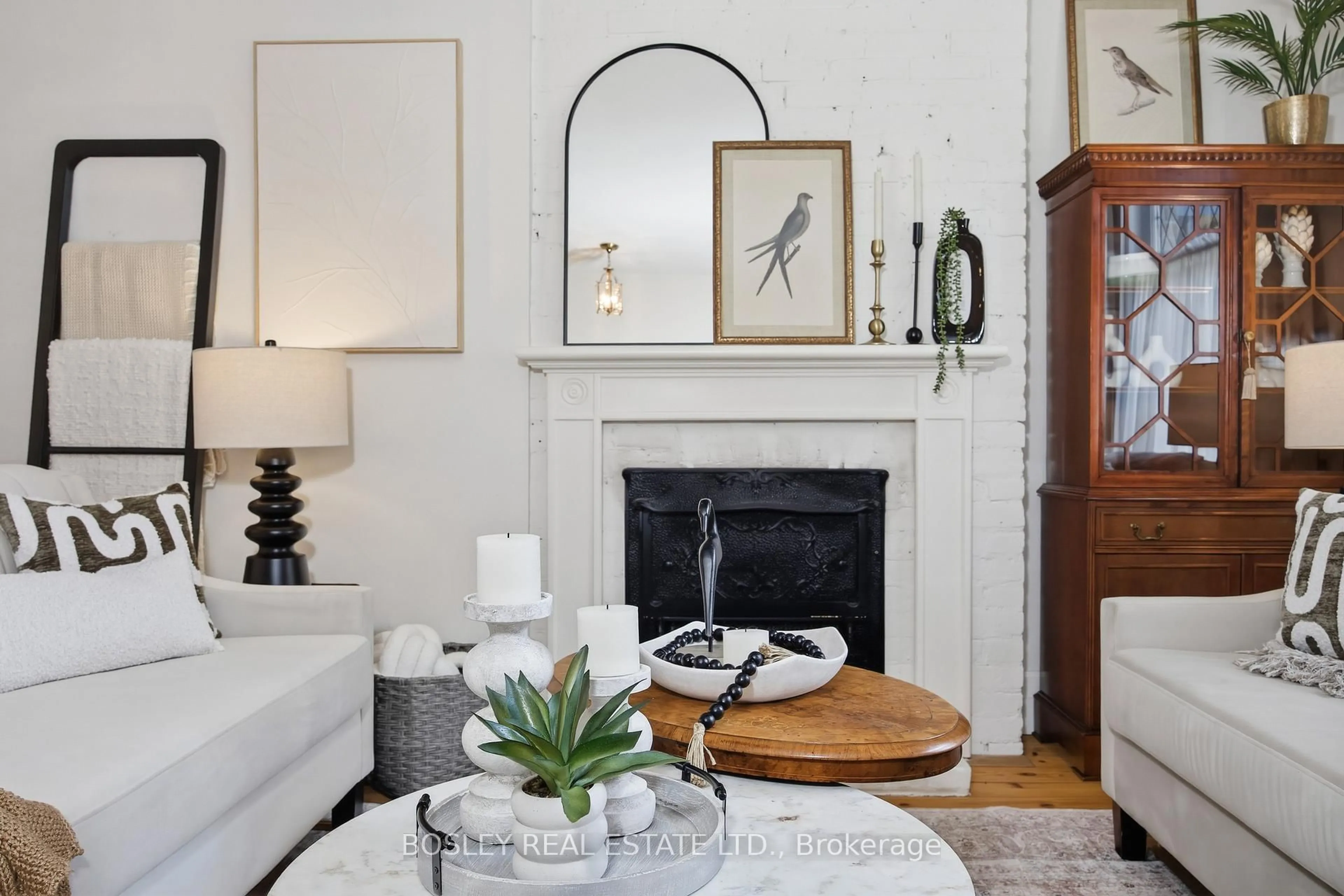 Living room with furniture, wood/laminate floor for 44 Birch Ave, Toronto Ontario M4V 1C8