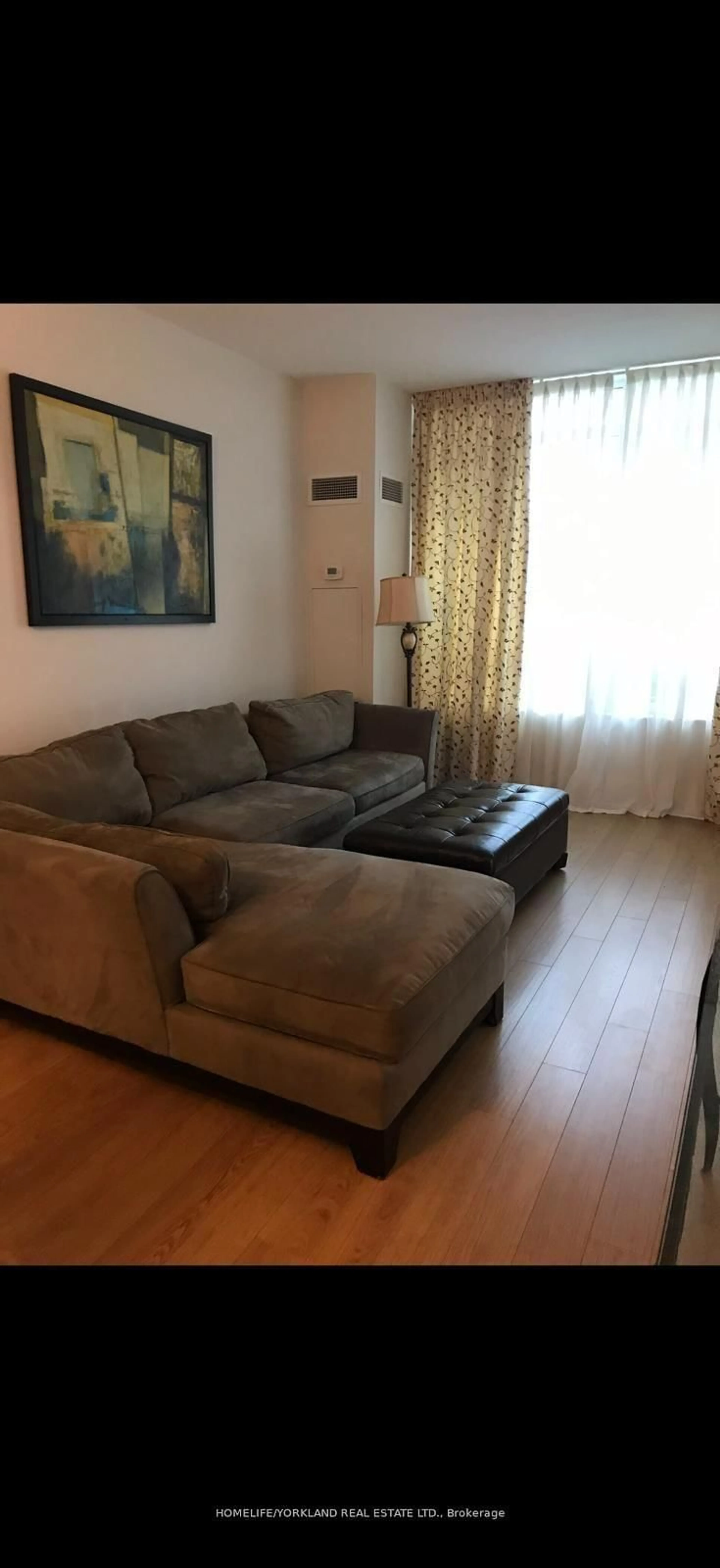 Living room with furniture, unknown for 181 Wynford Dr #411, Toronto Ontario M3C 0C6