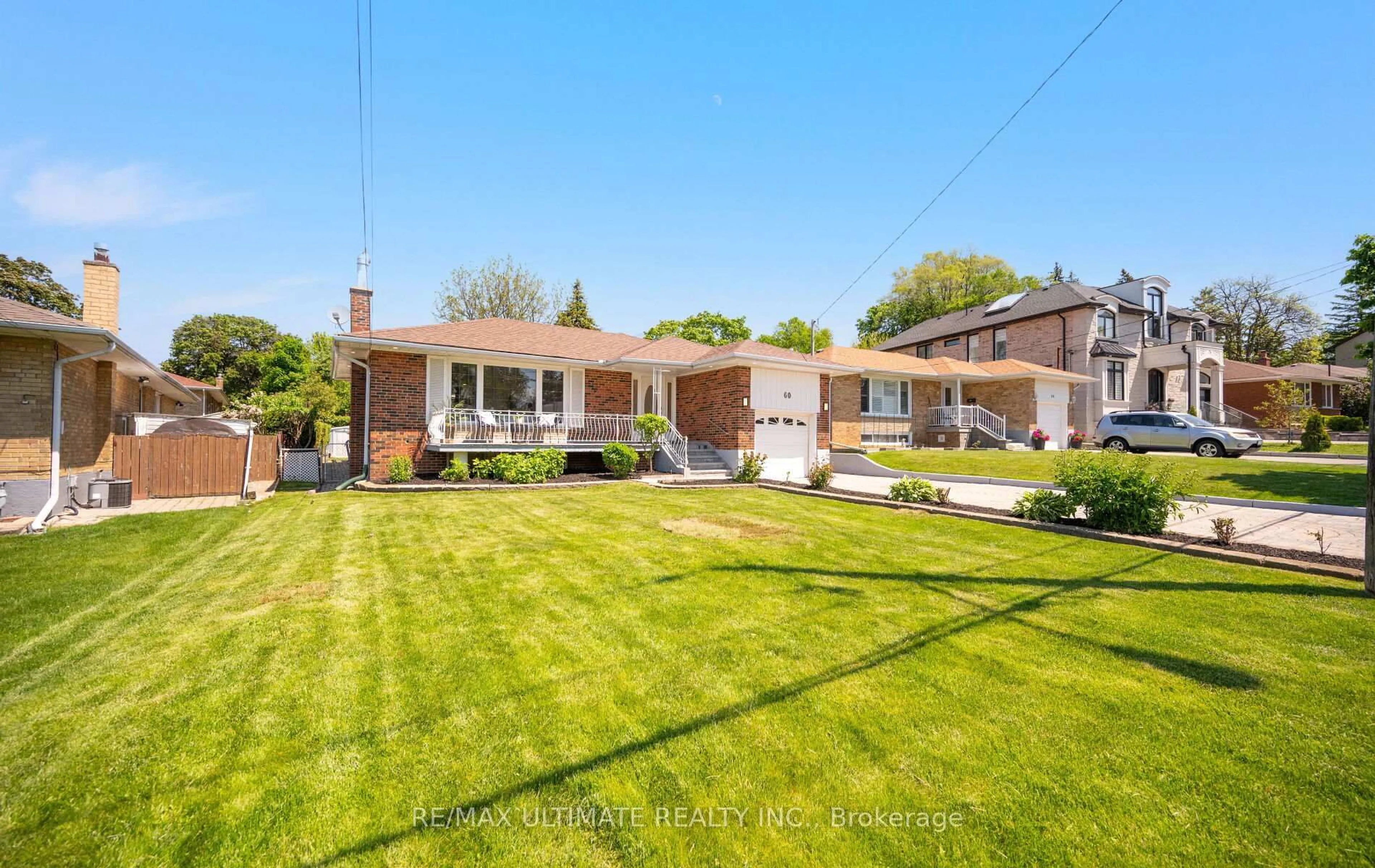 A pic from outside/outdoor area/front of a property/back of a property/a pic from drone, street for 60 Elvaston Dr, Toronto Ontario M4A 1N4