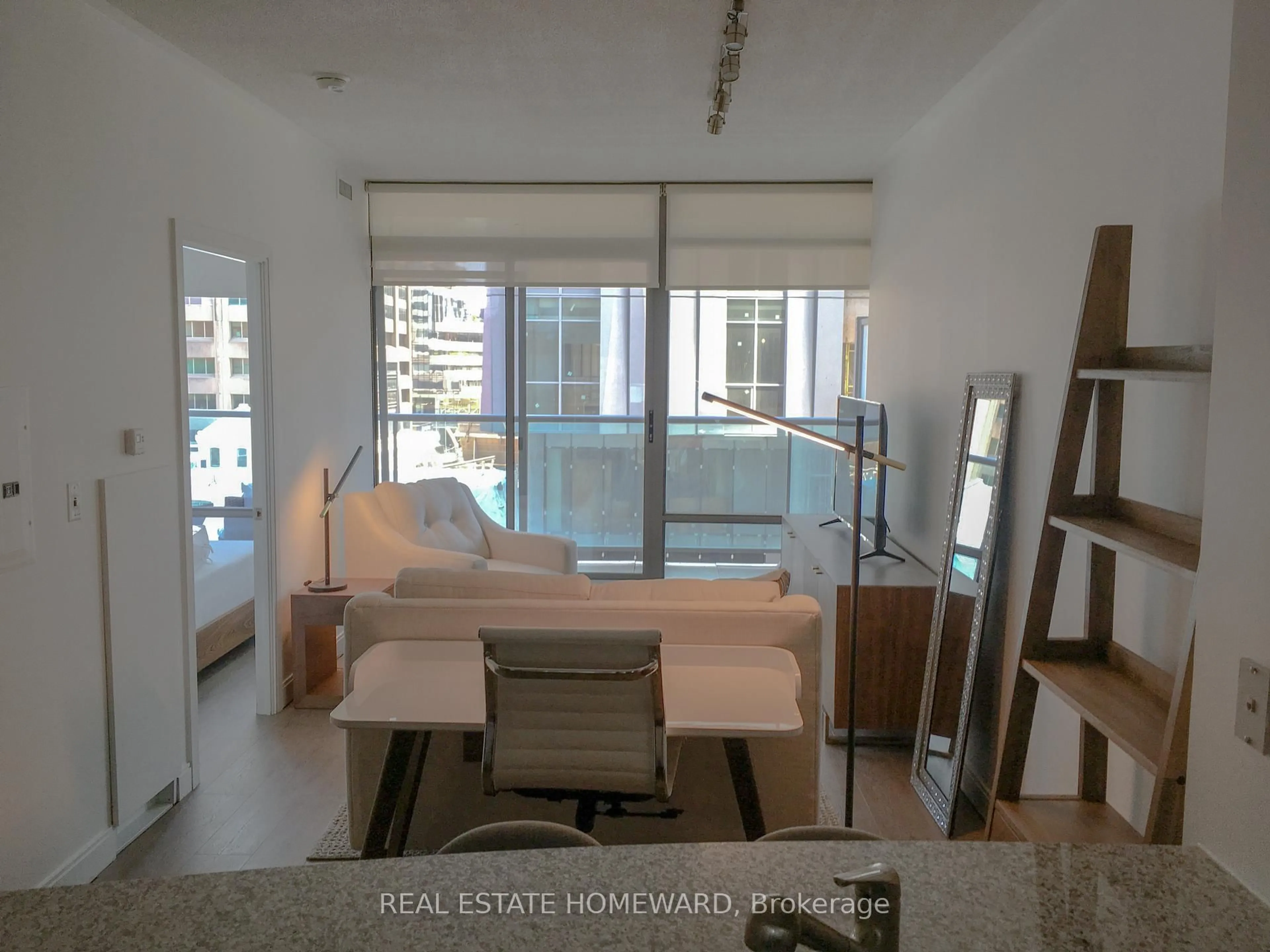 Living room with furniture, unknown for 18 Yorkville Ave #603, Toronto Ontario M4W 3Y8