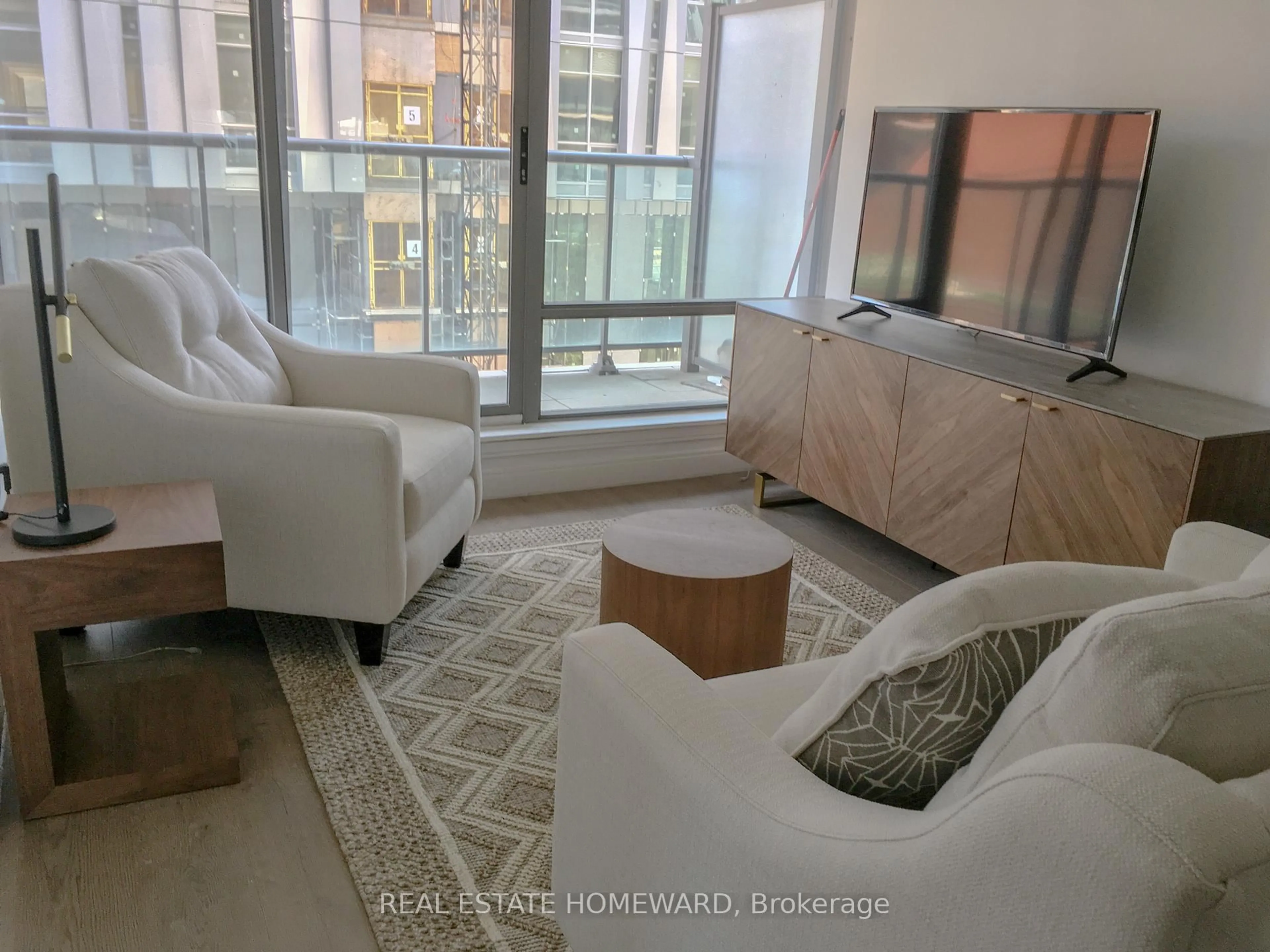 Living room with furniture, unknown for 18 Yorkville Ave #603, Toronto Ontario M4W 3Y8
